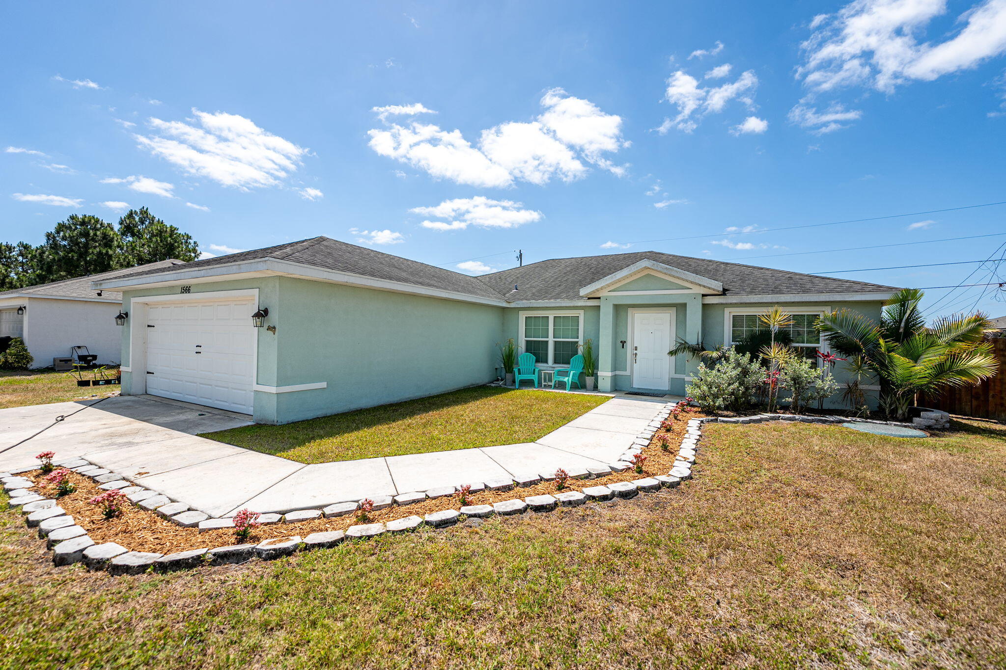 1566 Southwest Andalusia Road Port St. Lucie, FL 34953 - Photo 3 of 34 3-web-or-mls-1566-sw-andalusia-rd