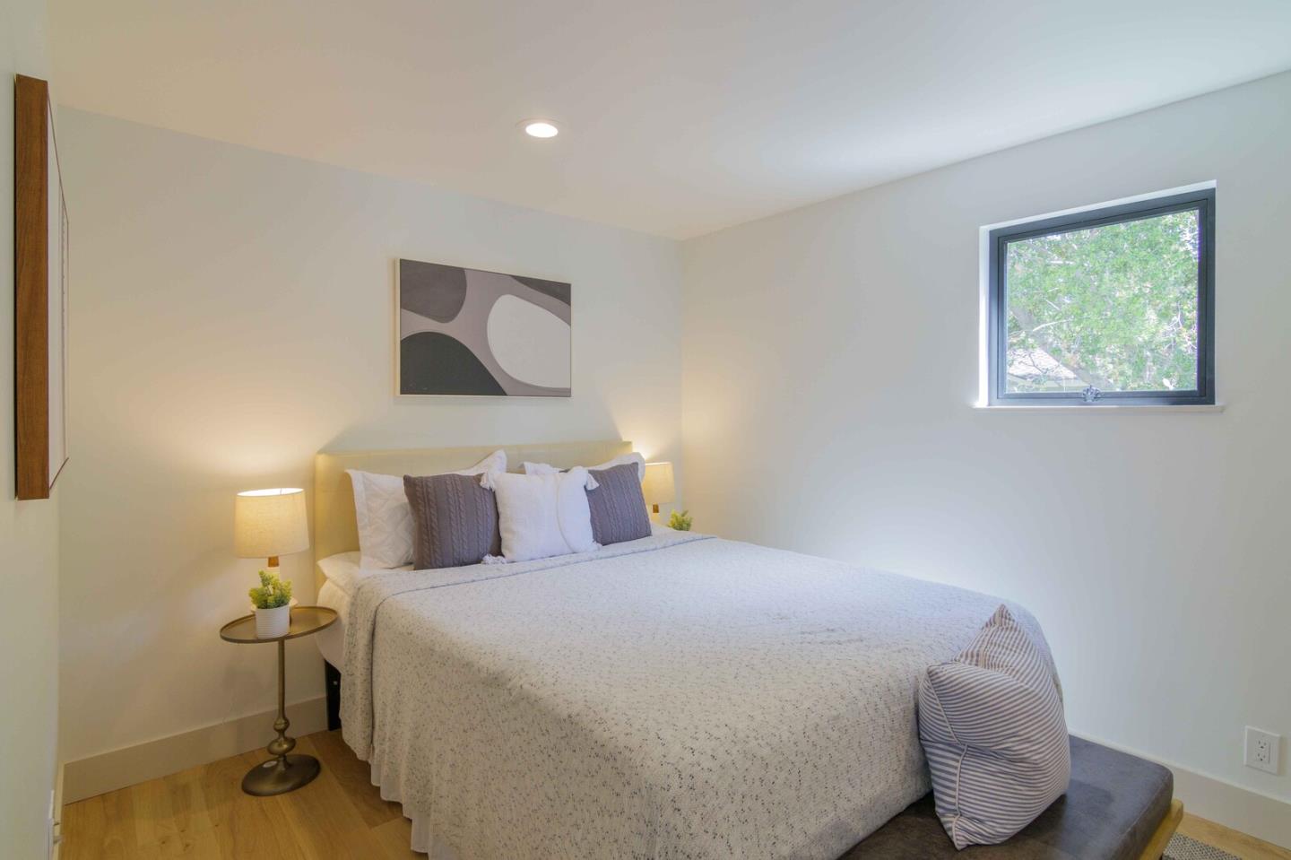 2465 Alpine Road Menlo Park, CA 94025 - Photo 16 of 28 a bedroom with a bed and wooden floor