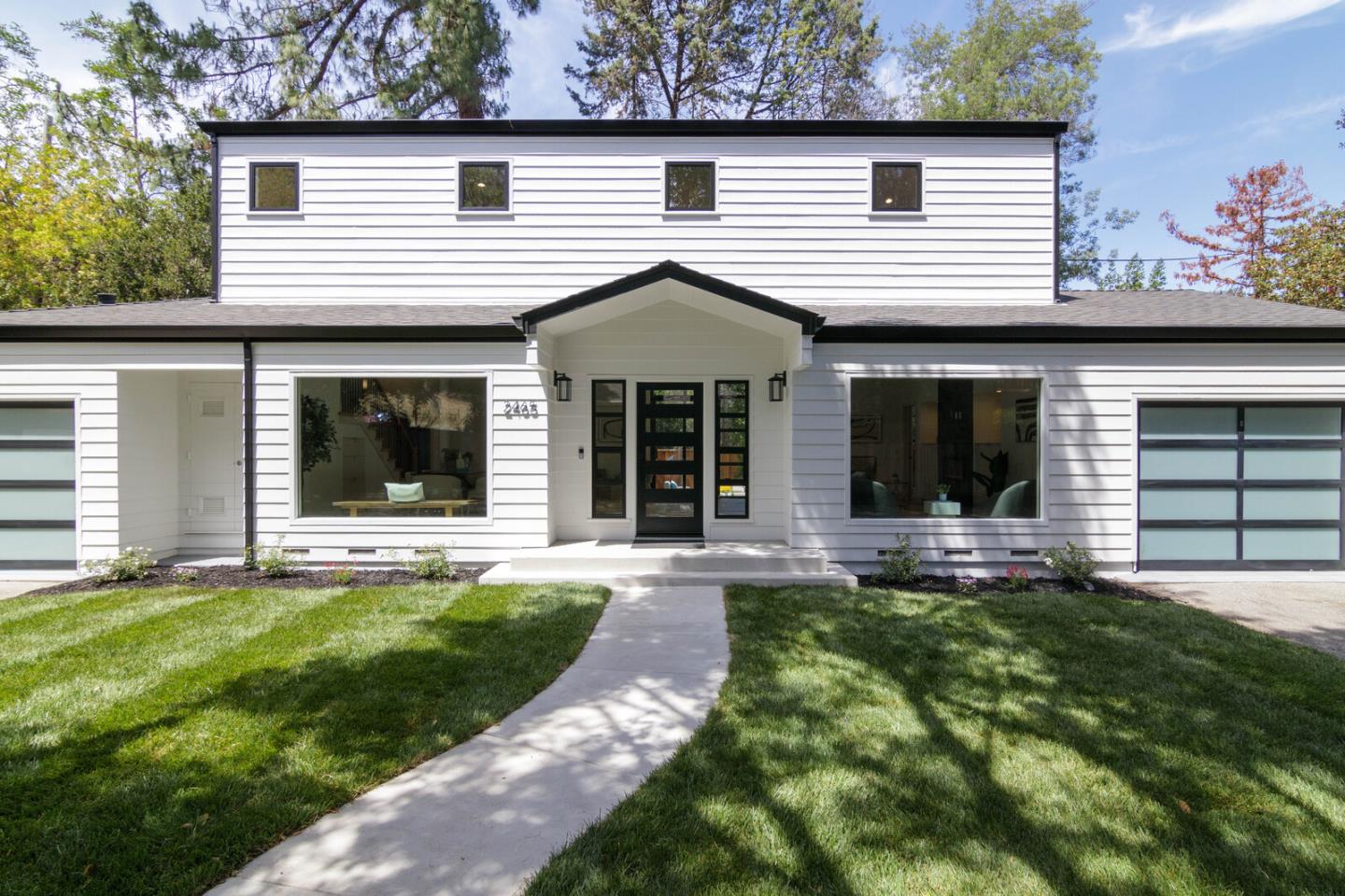 2465 Alpine Road Menlo Park, CA 94025 - Photo 2 of 28 a front view of a house with a garden and plants
