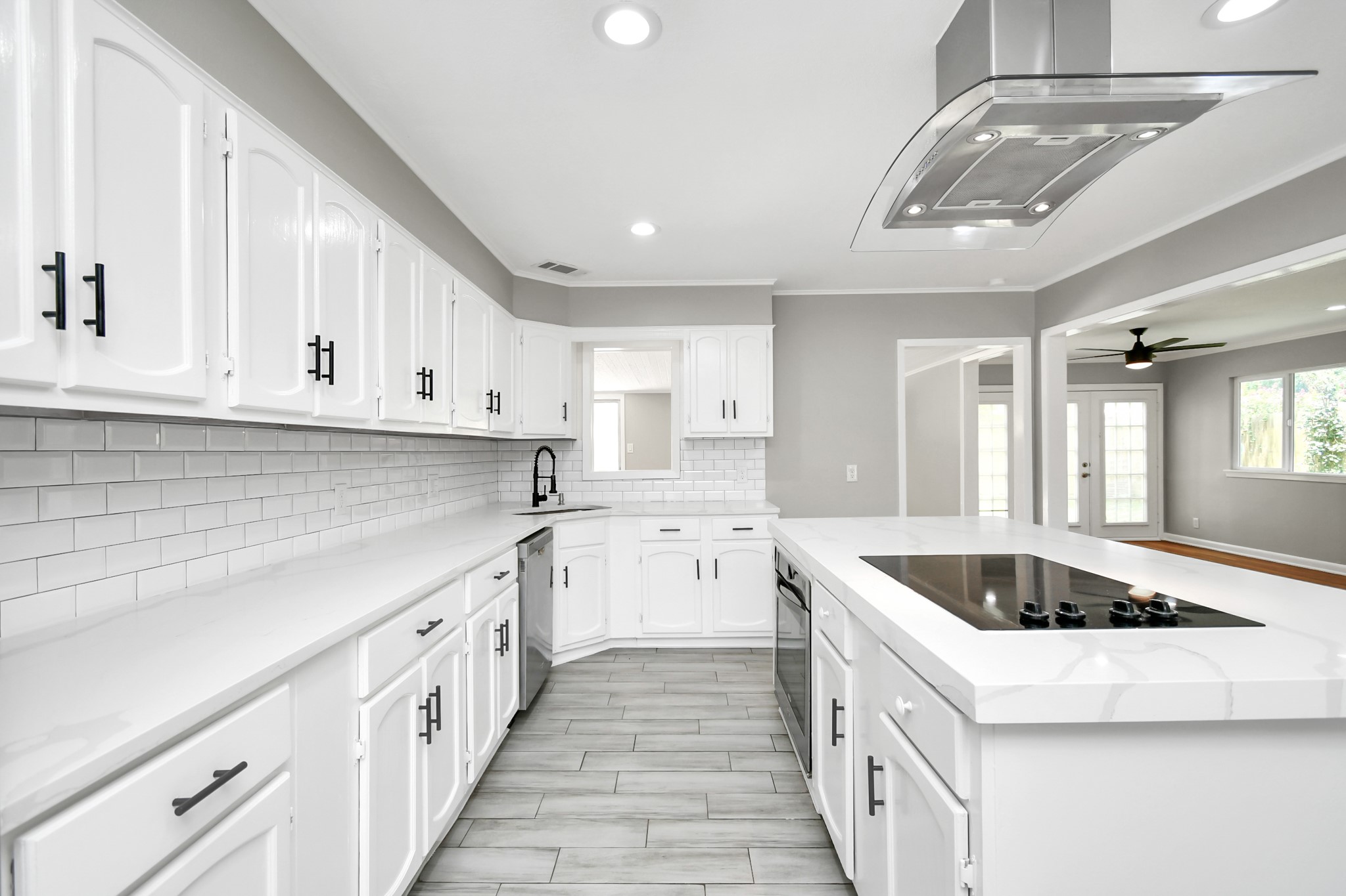 8034 Ridgeview Drive Houston, TX 77055 - Photo 11 of 44 a kitchen that has a sink and a stove top oven