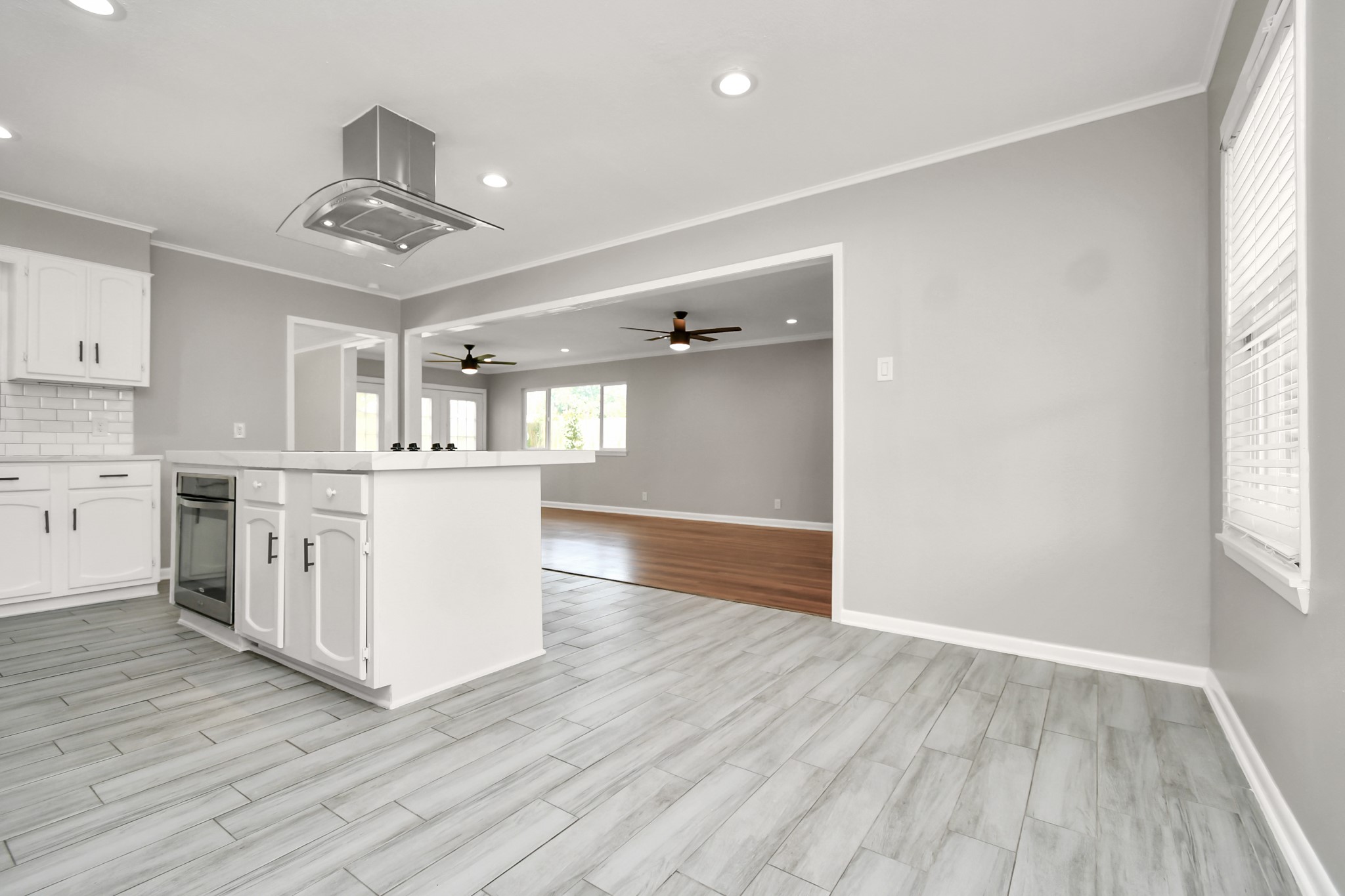 8034 Ridgeview Drive Houston, TX 77055 - Photo 18 of 44 a view of a kitchen with a sink and wooden floor