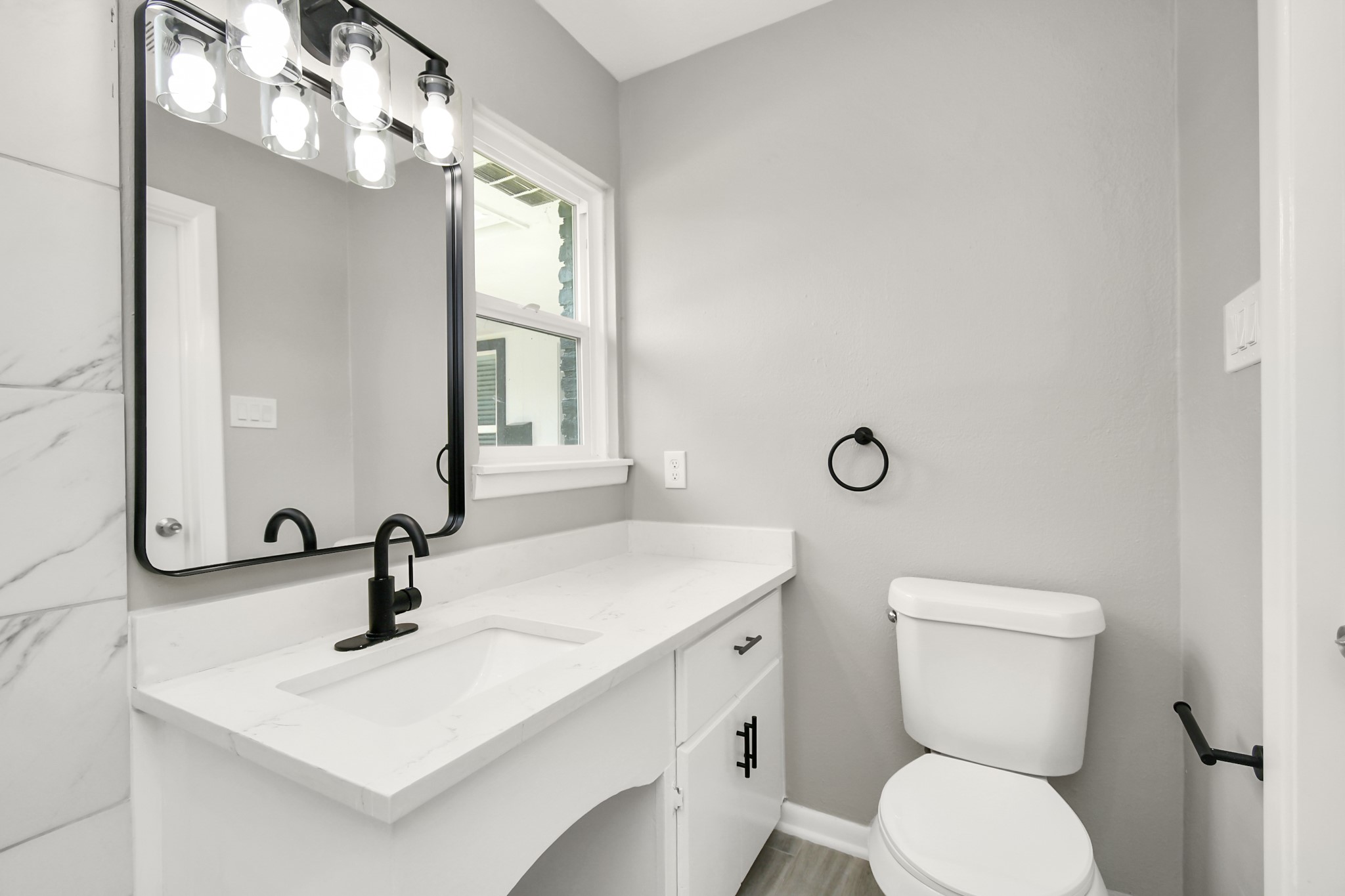 8034 Ridgeview Drive Houston, TX 77055 - Photo 30 of 44 a bathroom with a toilet sink and mirror