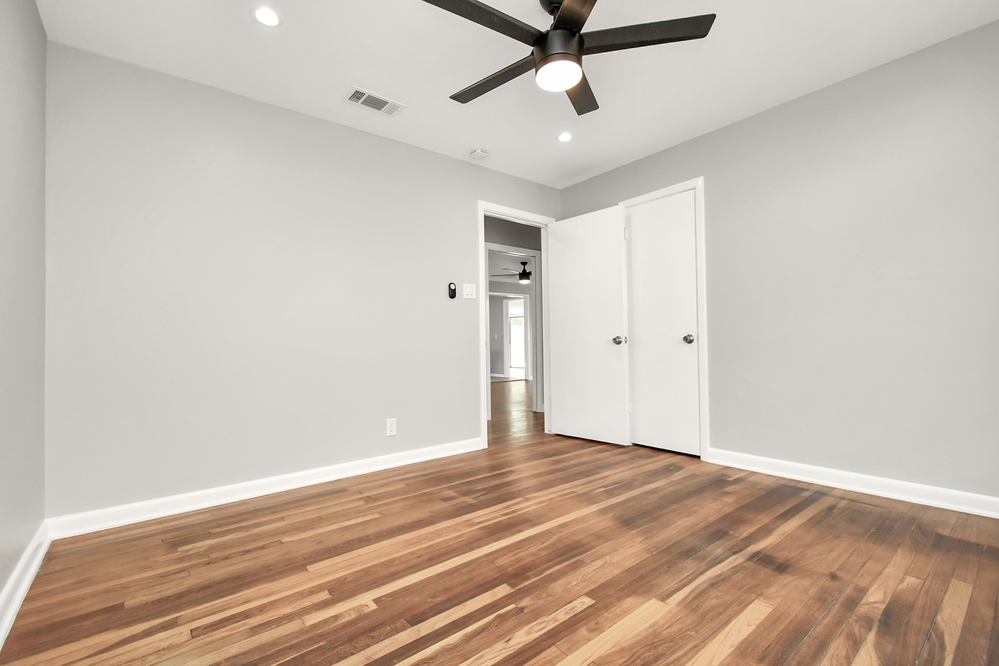 8034 Ridgeview Drive Houston, TX 77055 - Photo 33 of 44 wooden floor in an empty room