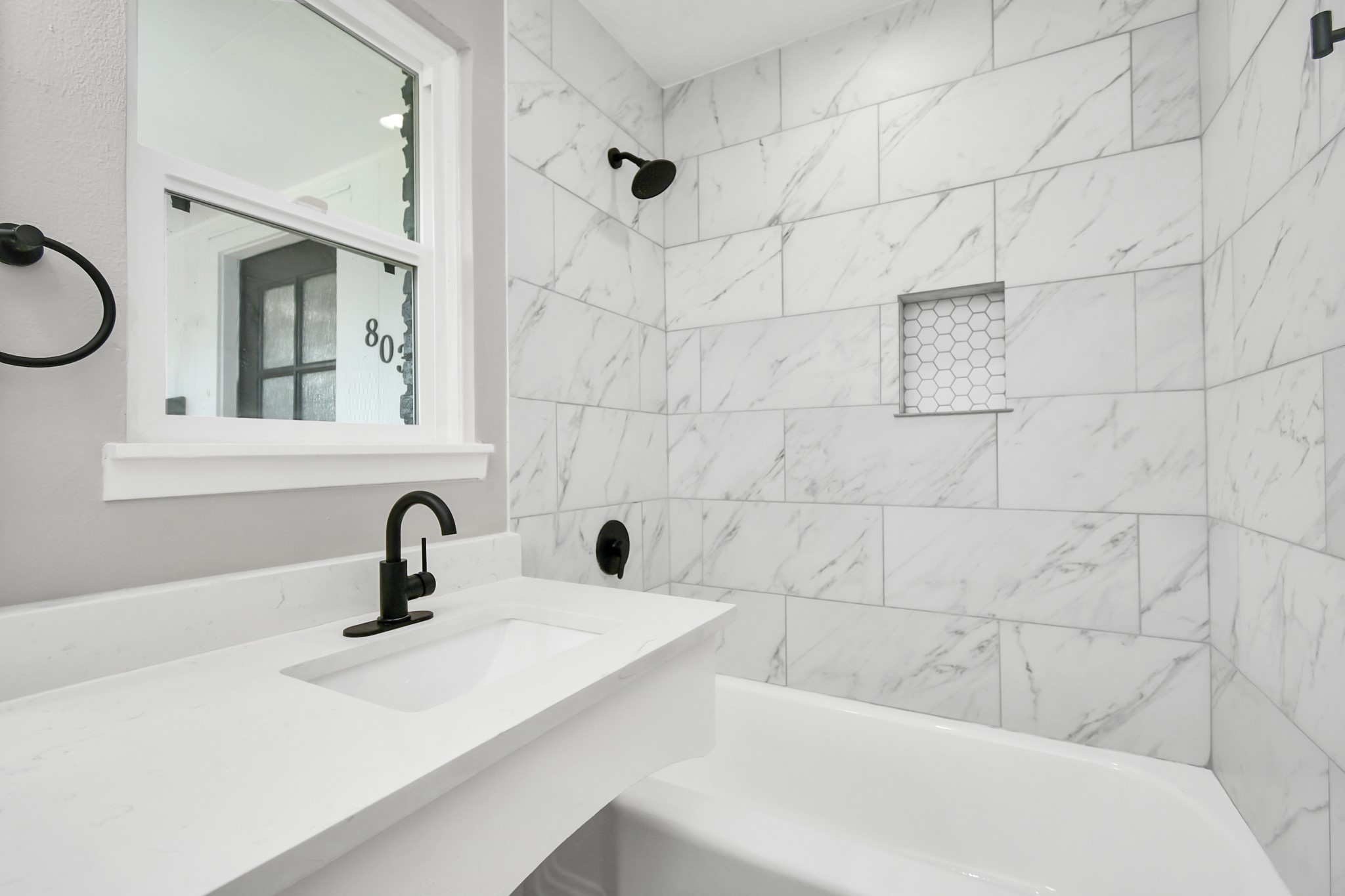 8034 Ridgeview Drive Houston, TX 77055 - Photo 35 of 44 a bathroom with a sink a toilet and mirror