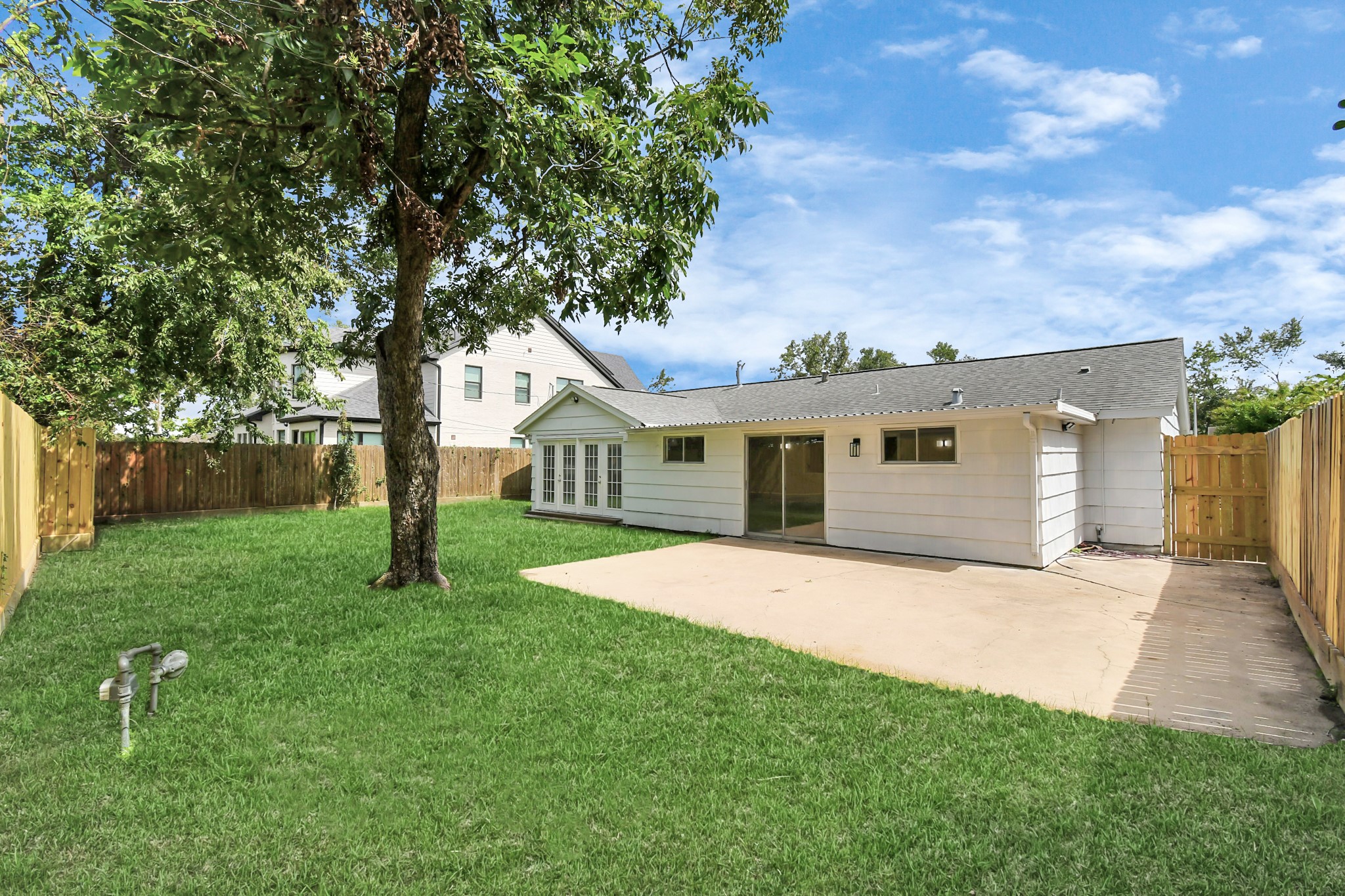 8034 Ridgeview Drive Houston, TX 77055 - Photo 39 of 44 a front view of a house with a yard and garage