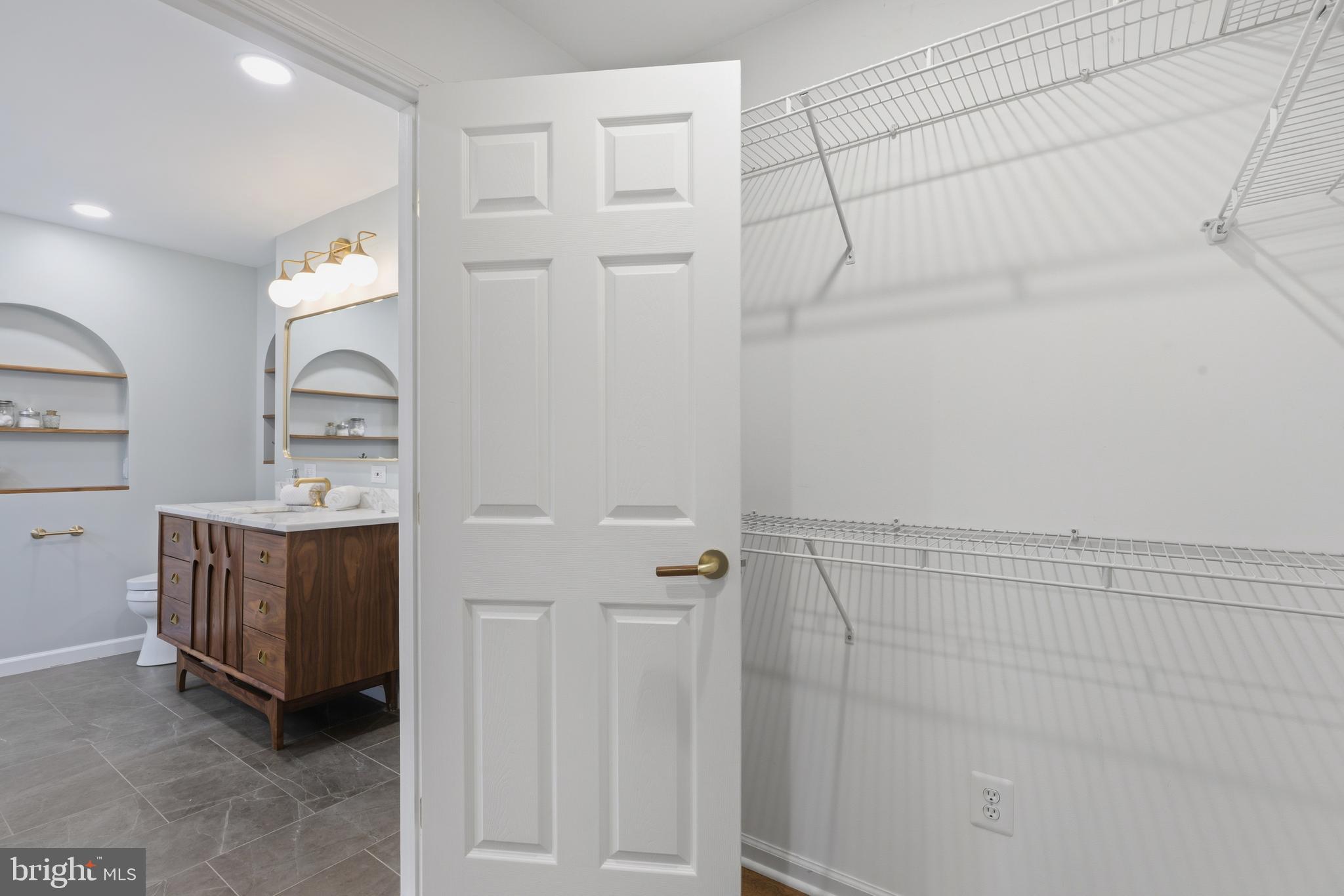 1322 Quail Ridge Drive Reston, VA 20194 - Photo 33 of 59 Primary walkin closet off of bath