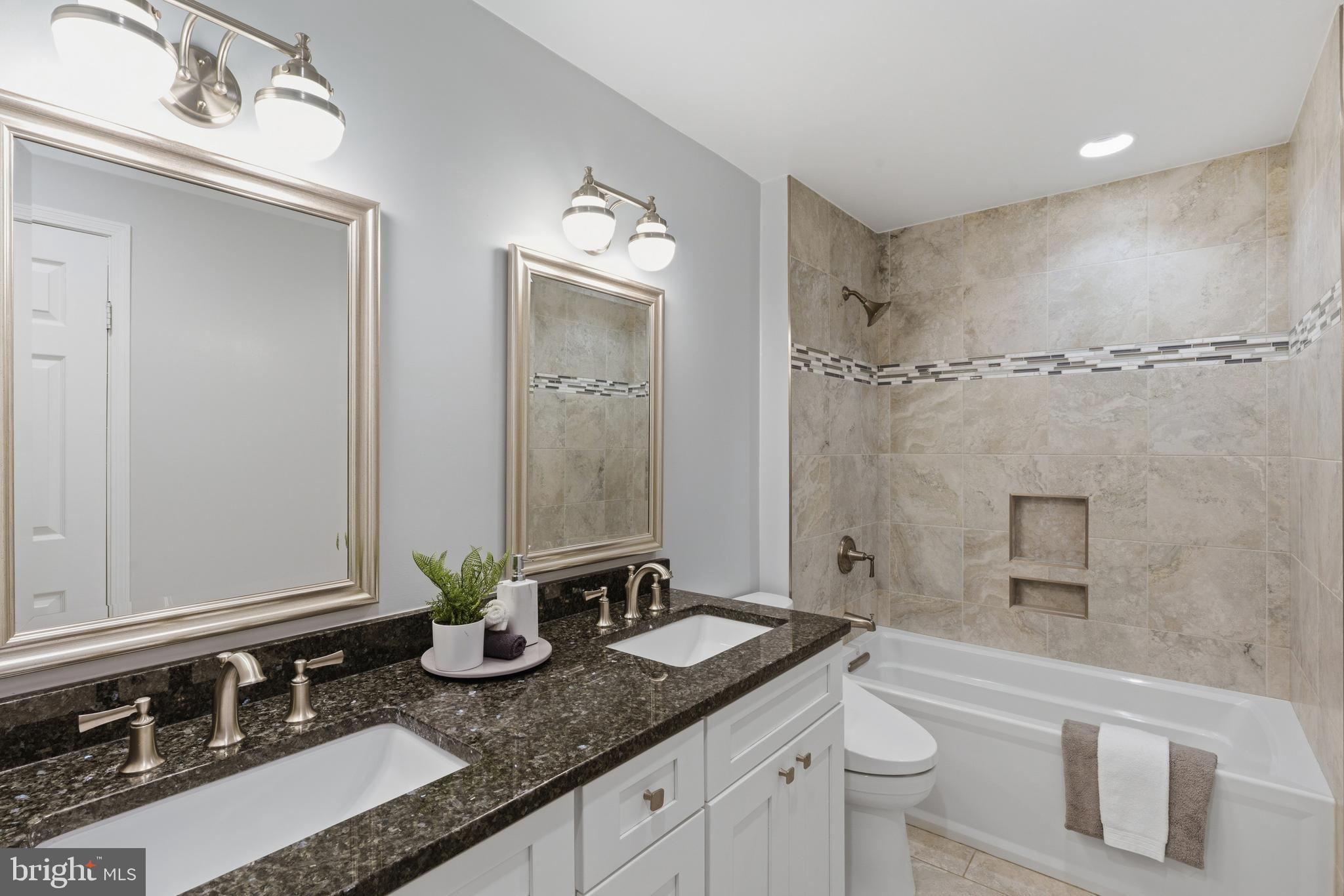 1322 Quail Ridge Drive Reston, VA 20194 - Photo 36 of 59 dual vanity renovated hall bath