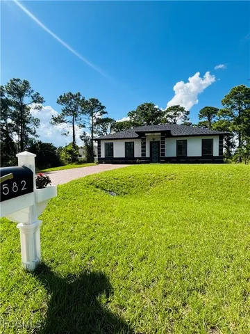 $329,900 | 582 Eisenhower Boulevard, Lehigh Acres, FL 33974