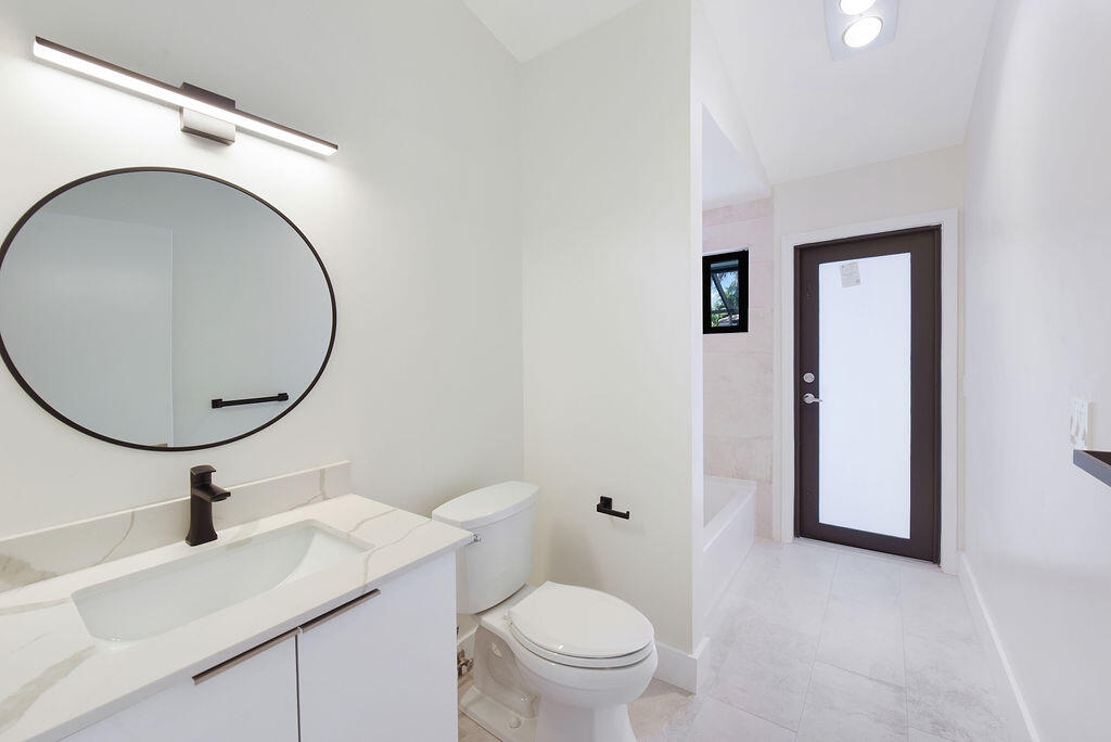 7230 Northwest 4th Avenue Boca Raton, FL 33487 - Photo 29 of 49 Guest Bathroom