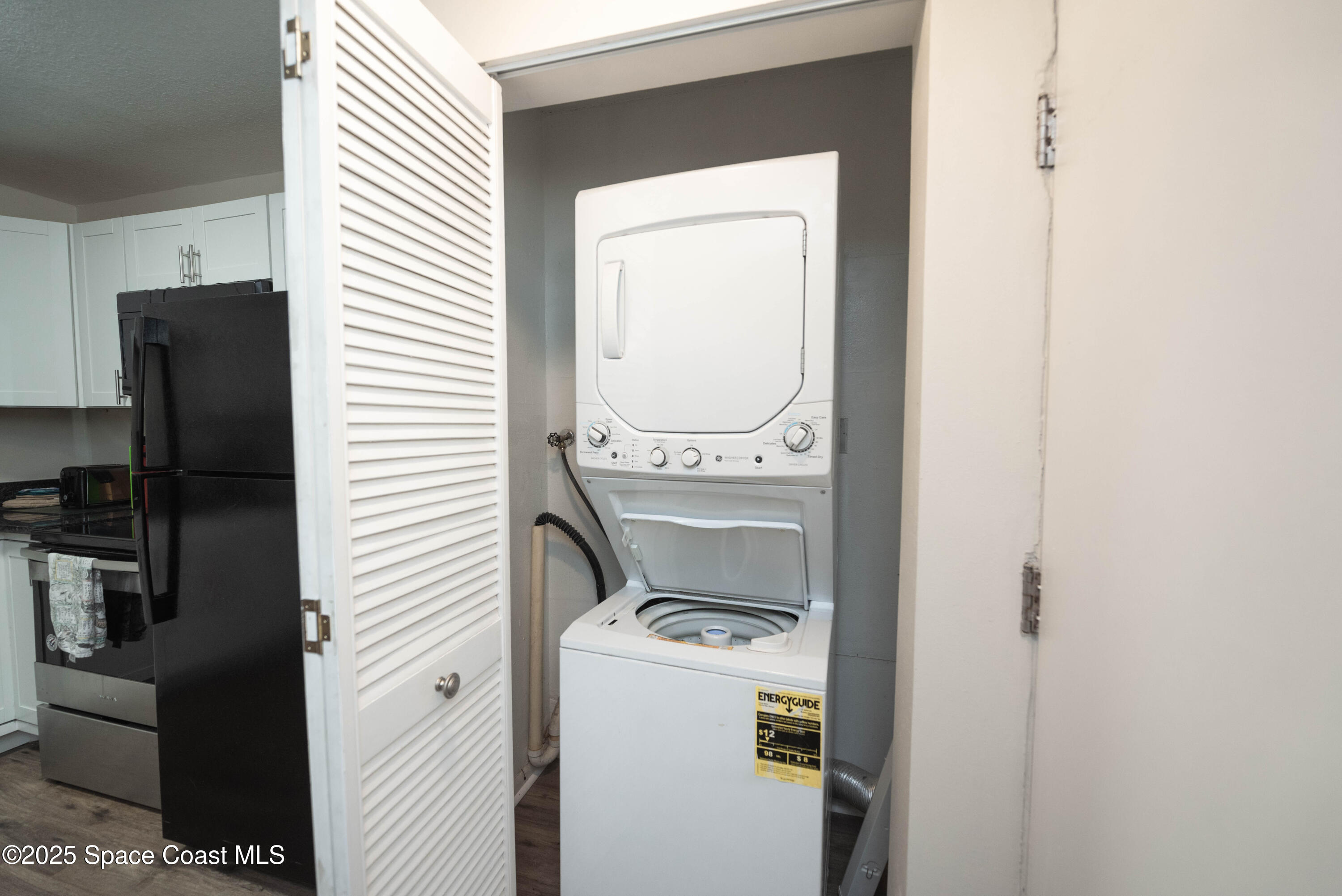3150 North Atlantic Avenue, Unit 1770 Cocoa Beach, FL 32931 - Photo 20 of 21 a view of washer and dryer