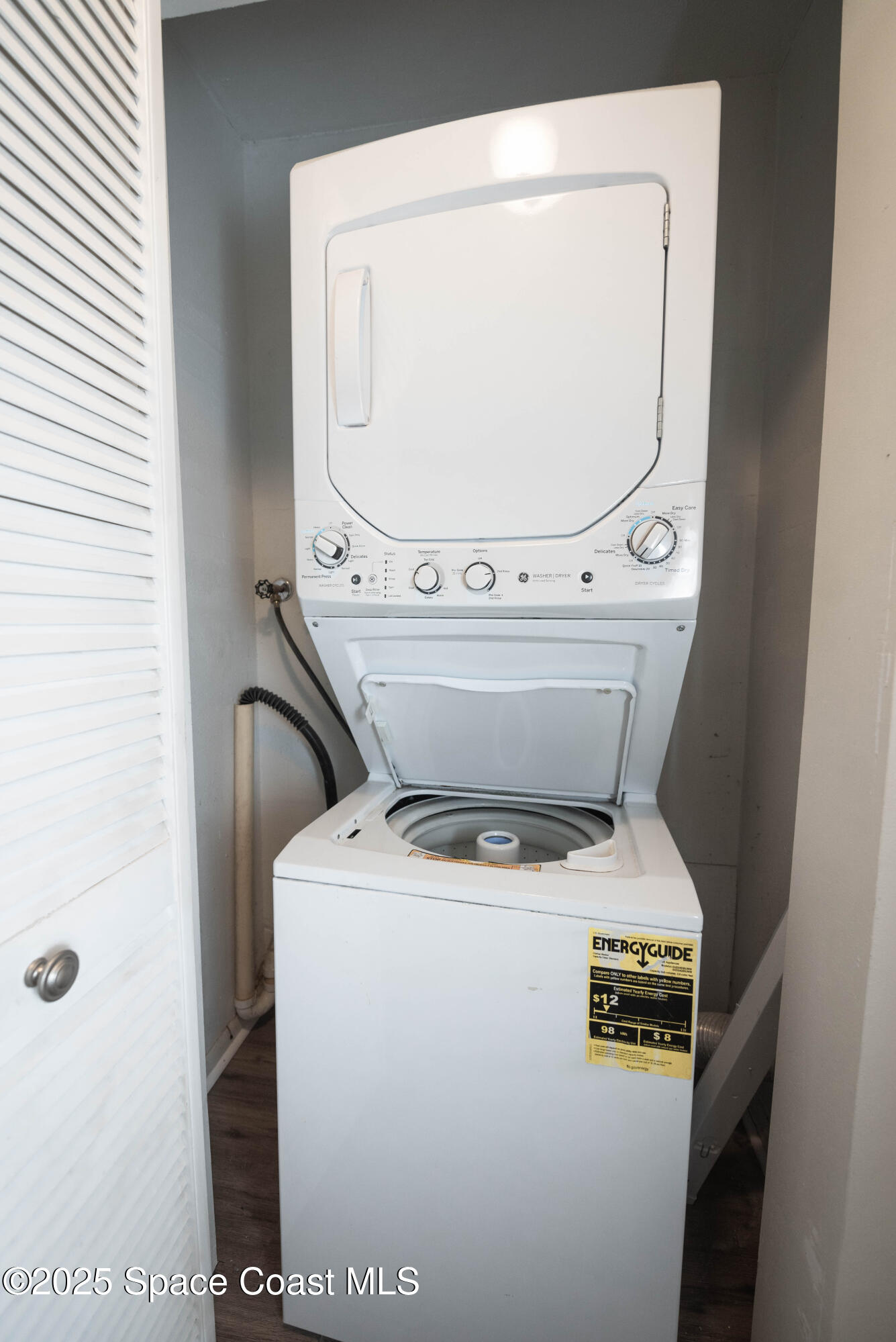 3150 North Atlantic Avenue, Unit 1770 Cocoa Beach, FL 32931 - Photo 21 of 21 a close view of washer and dryer