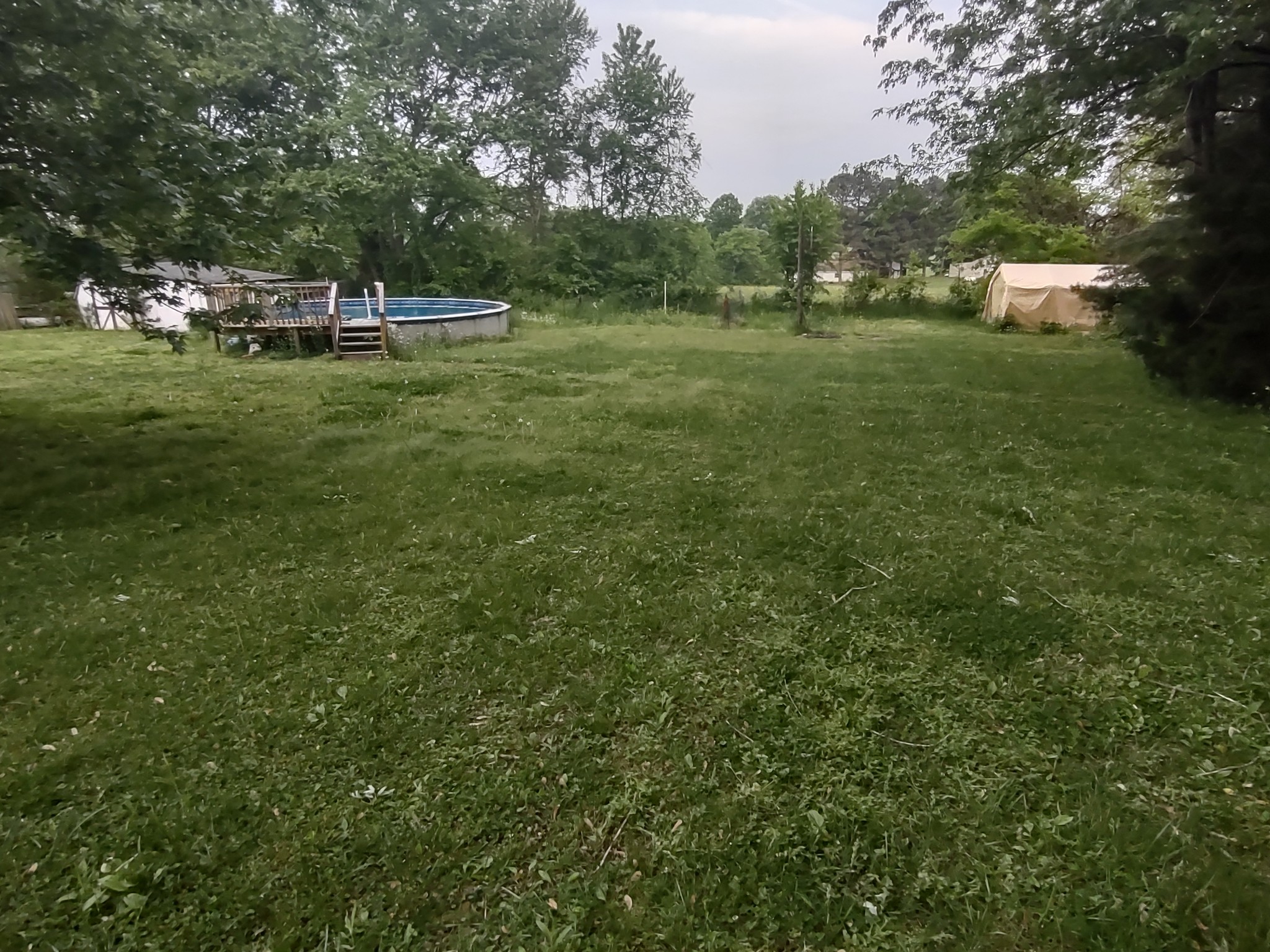3833 Robert Pryor Road Springfield, TN 37172 - Photo 5 of 5 a backyard of a house with table and chairs