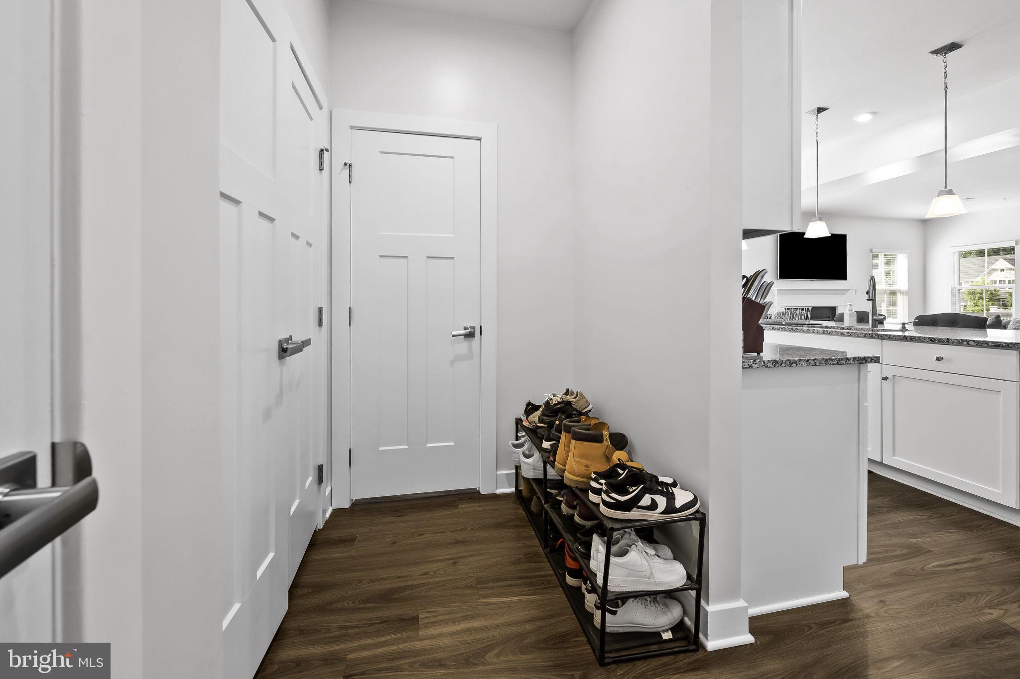 2157 Nottoway Drive Hanover, MD 21076 - Photo 21 of 50 a view of a room with wooden floor and furniture