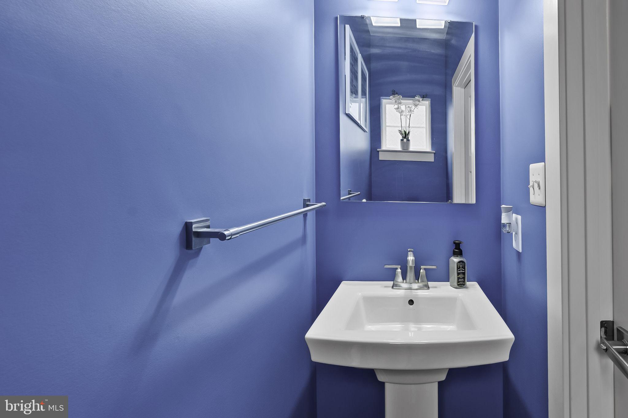 2157 Nottoway Drive Hanover, MD 21076 - Photo 22 of 50 a bathroom with a sink a mirror and vanity