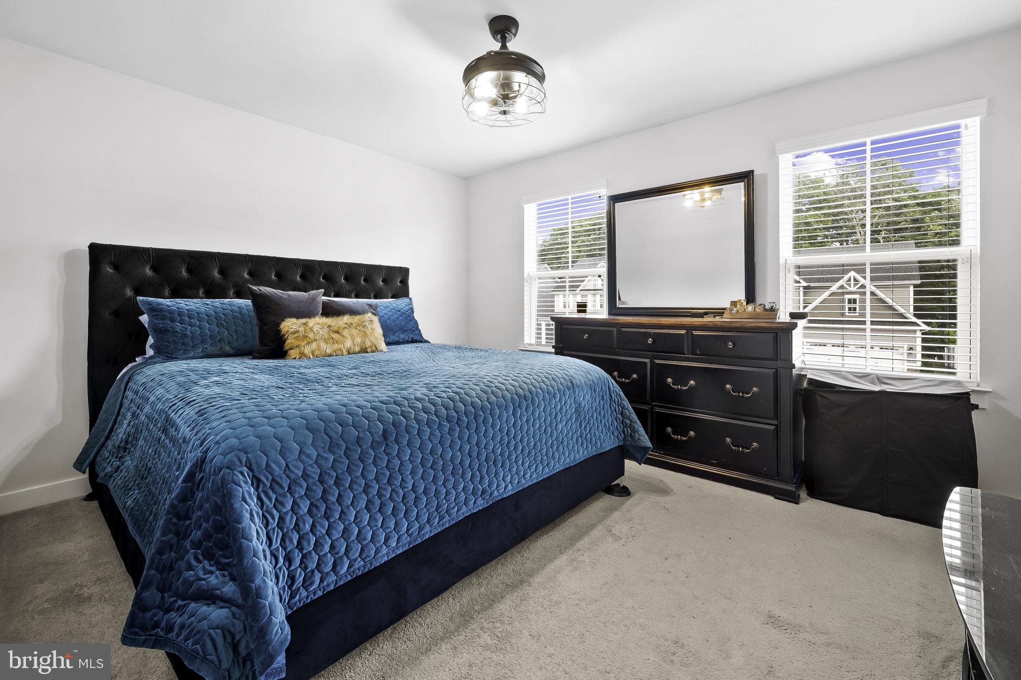 2157 Nottoway Drive Hanover, MD 21076 - Photo 27 of 50 a bedroom with a bed and wooden floor