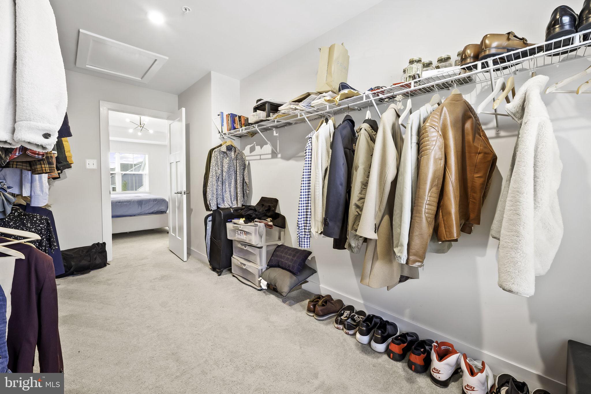 2157 Nottoway Drive Hanover, MD 21076 - Photo 36 of 50 a view of walk in closet with clothes and shoes