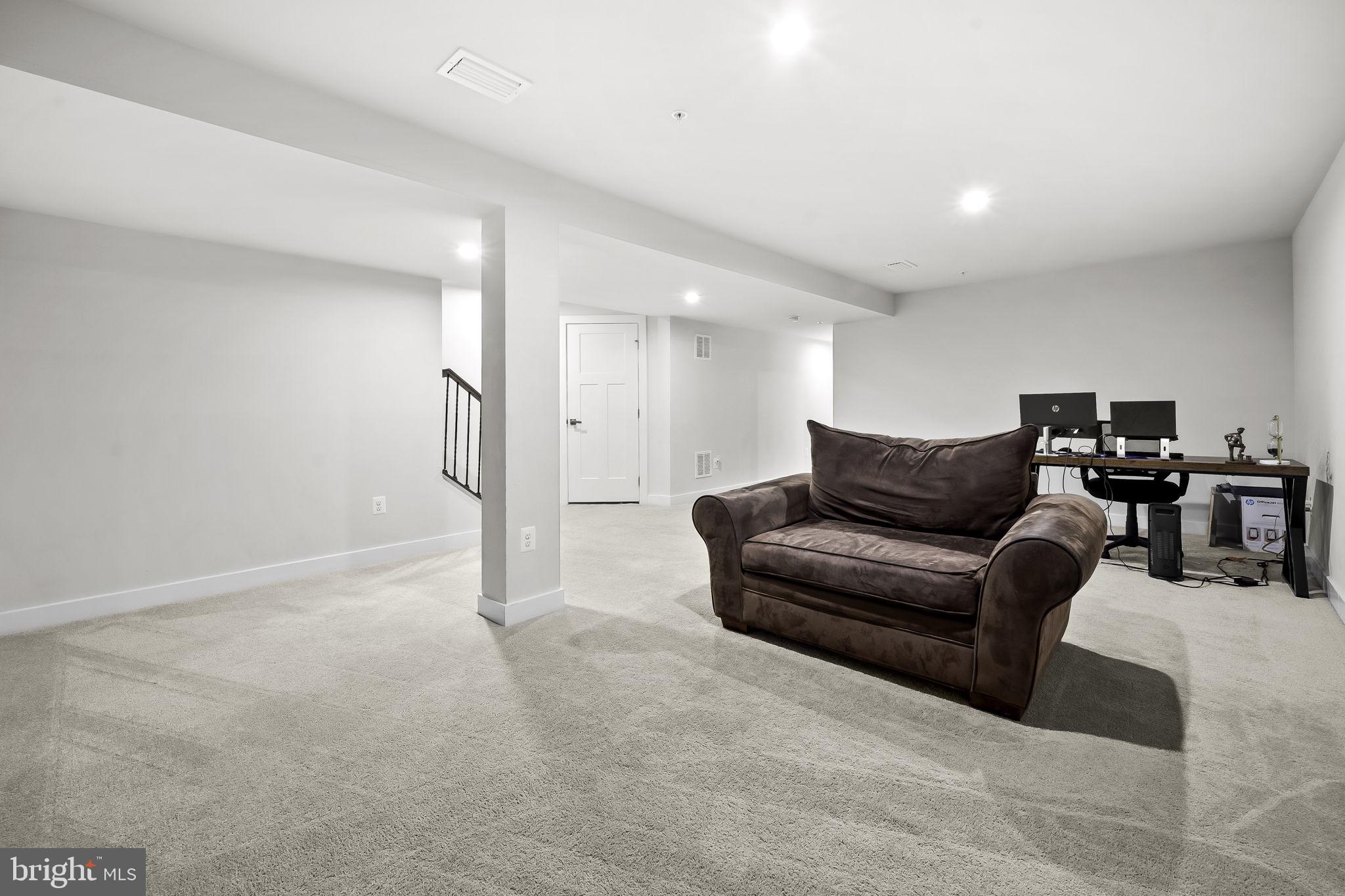 2157 Nottoway Drive Hanover, MD 21076 - Photo 39 of 50 a living room with furniture and a glass door