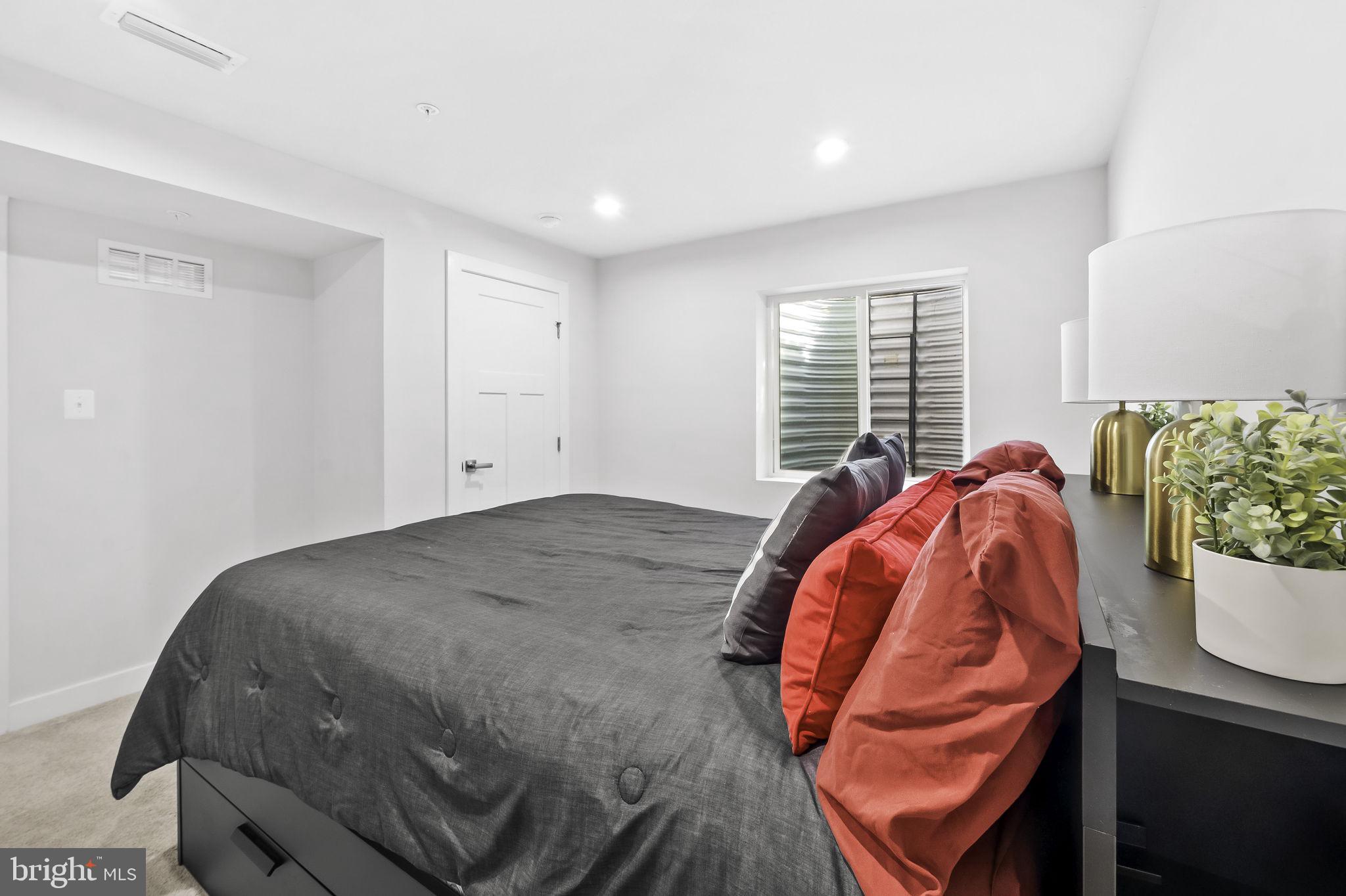 2157 Nottoway Drive Hanover, MD 21076 - Photo 42 of 50 a view of a bedroom with a bed and a window
