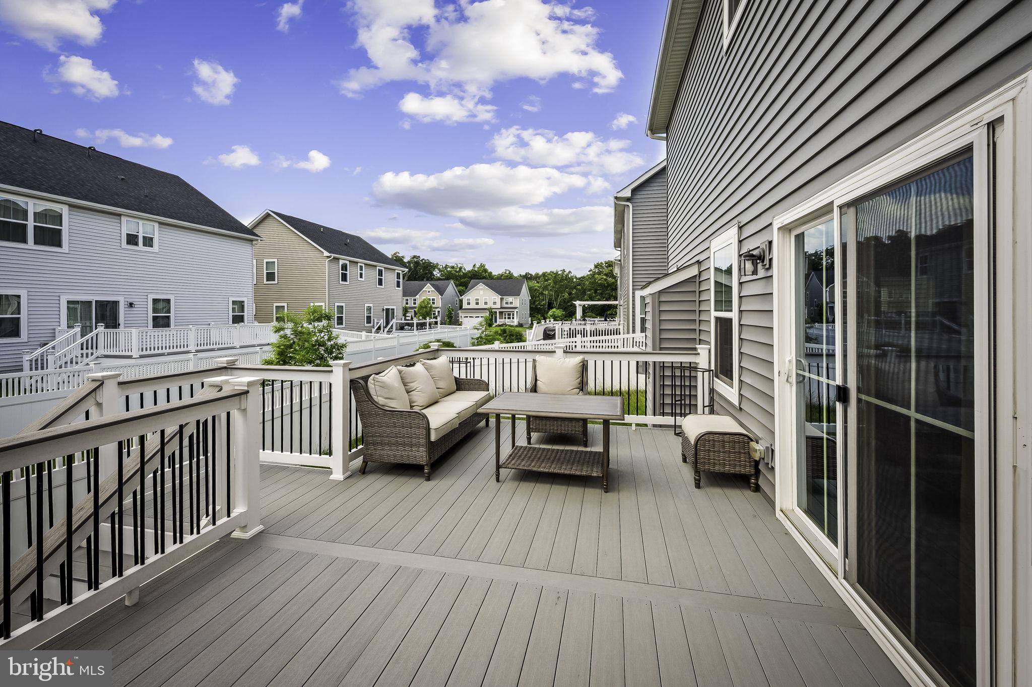 2157 Nottoway Drive Hanover, MD 21076 - Photo 45 of 50 a balcony with furniture and a potted plant