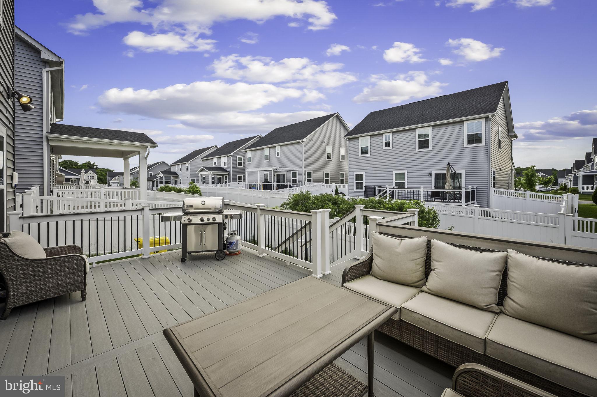 2157 Nottoway Drive Hanover, MD 21076 - Photo 47 of 50 a view of a terrace with furniture and wooden floor