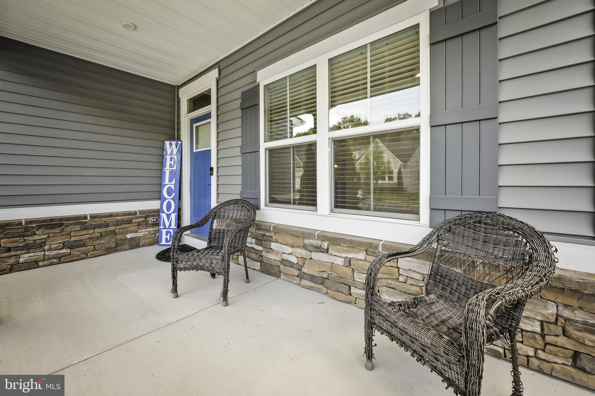 2157 Nottoway Drive Hanover, MD 21076 - Photo 7 of 50 a balcony with furniture and a window