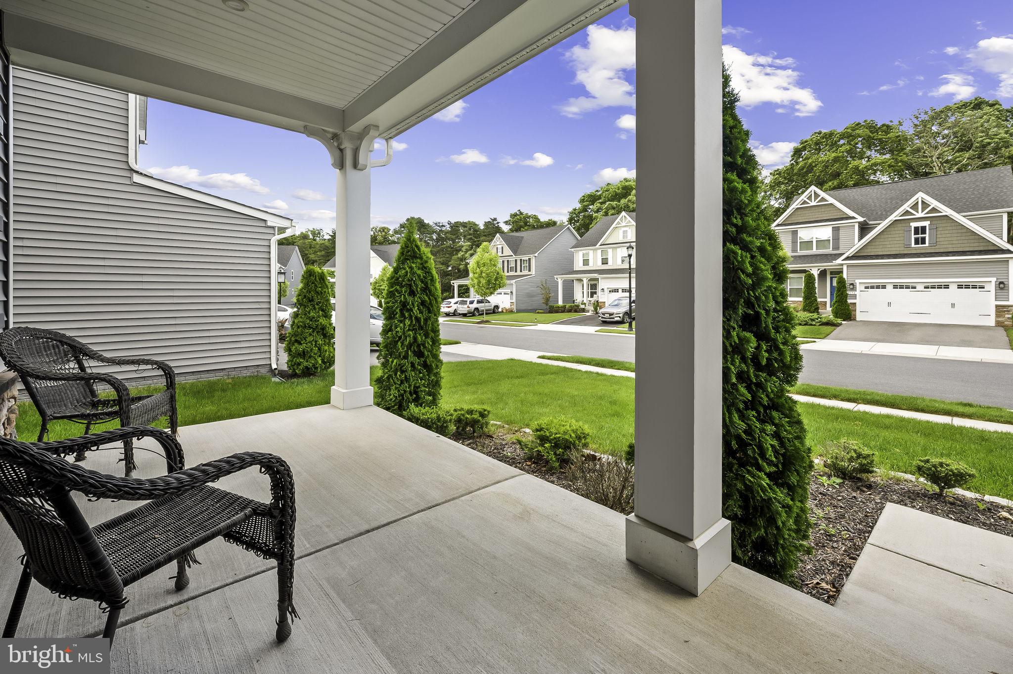 2157 Nottoway Drive Hanover, MD 21076 - Photo 8 of 50 a view of a patio with table and chairs and potted plants