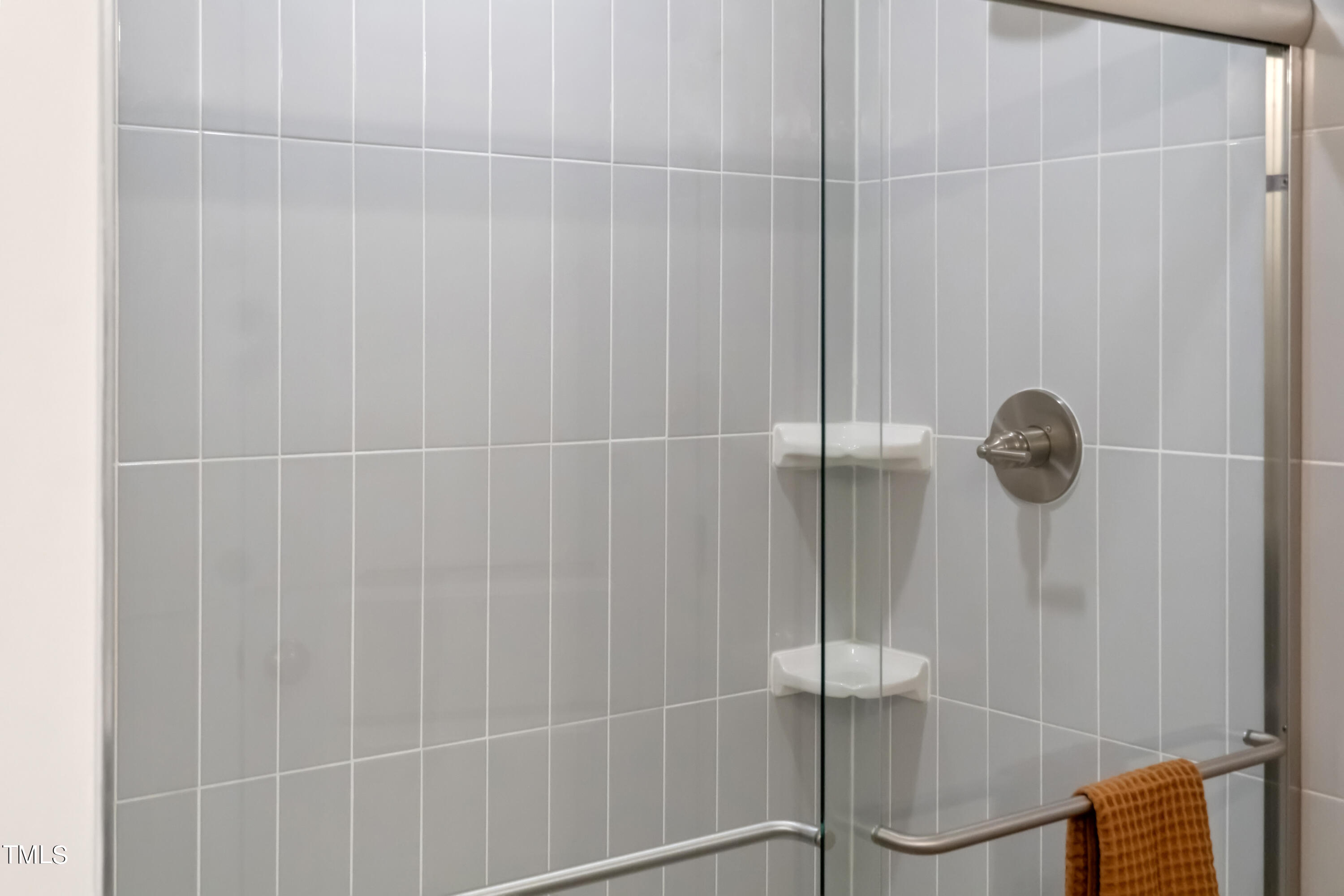 4969 Caddis Bend Raleigh, NC 27604 - Photo 18 of 30 a bathroom with a shower