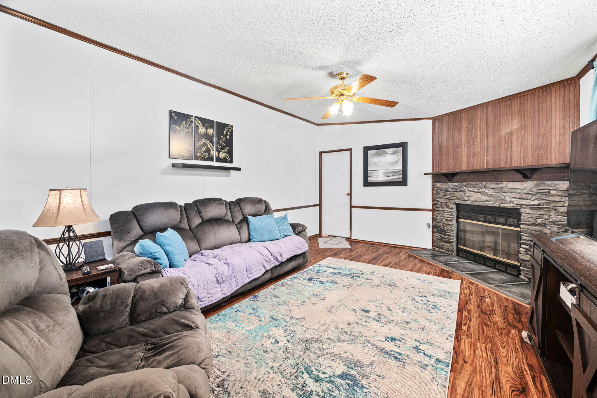 2005 Mooregate Court Clayton, NC 27520 - Photo 13 of 31 a living room with furniture and a fireplace