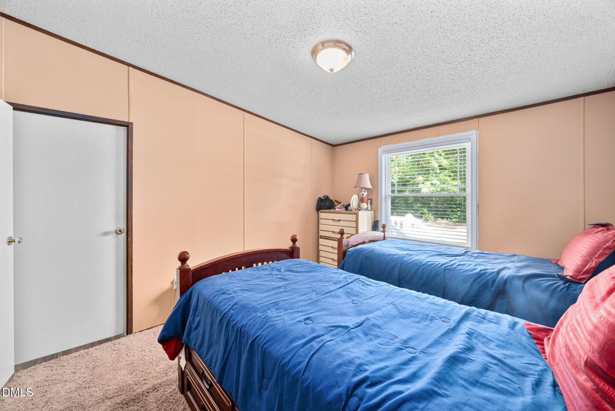 2005 Mooregate Court Clayton, NC 27520 - Photo 20 of 31 a bedroom with a large bed and a window