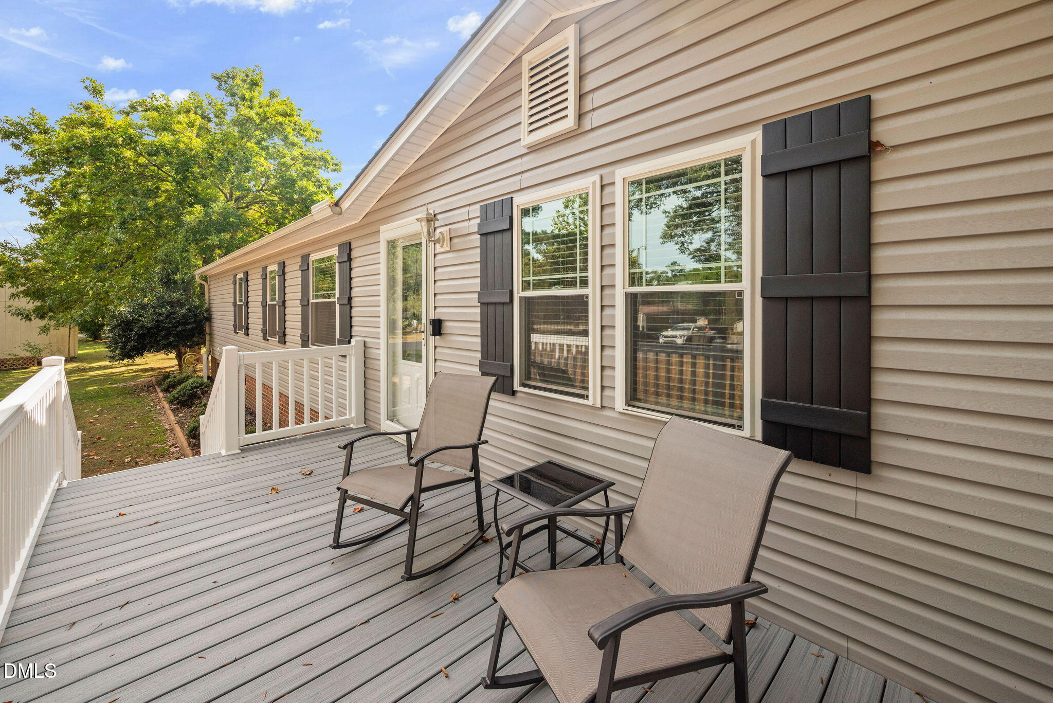 2005 Mooregate Court Clayton, NC 27520 - Photo 2 of 31 a view of a house with backyard and sitting area