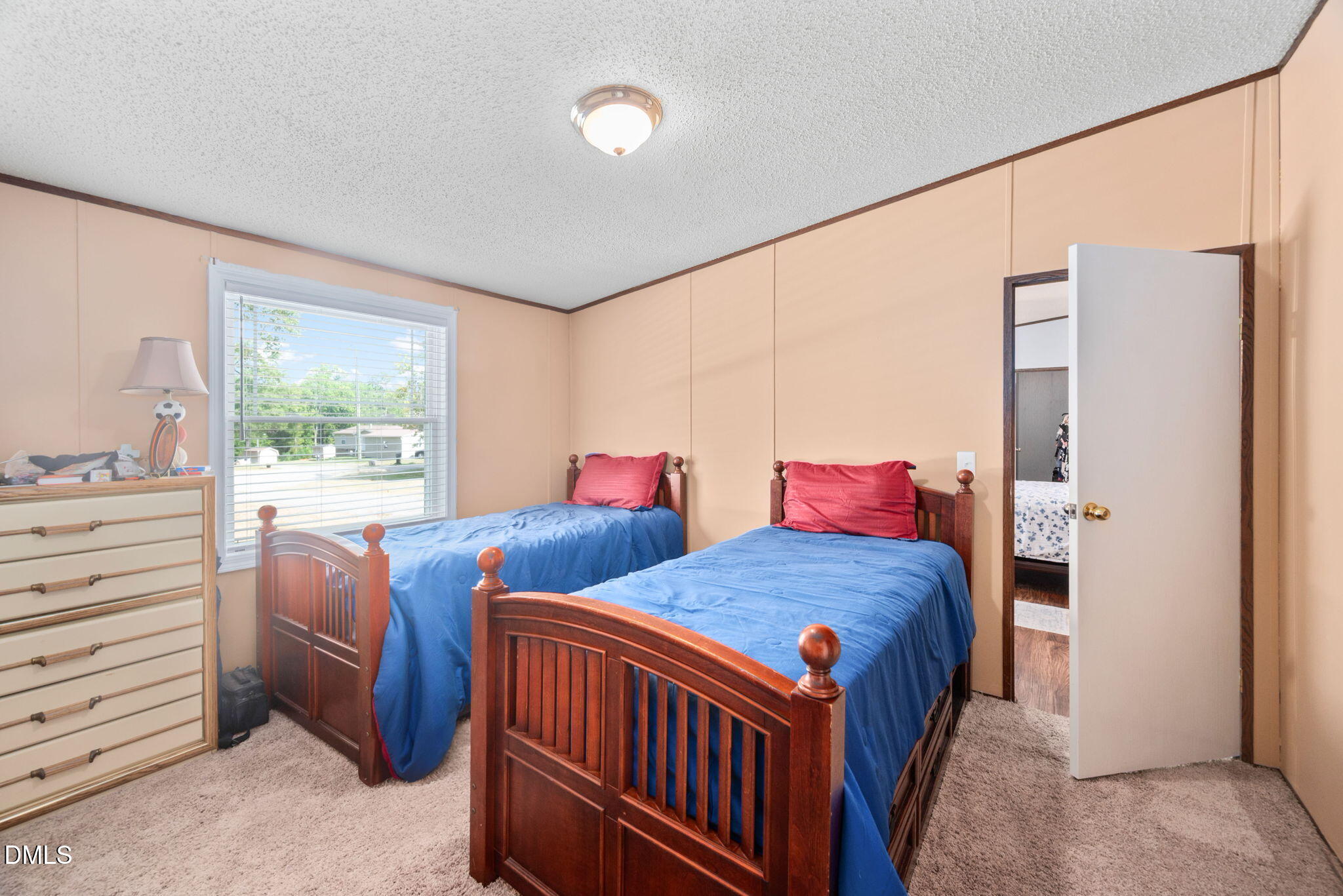 2005 Mooregate Court Clayton, NC 27520 - Photo 21 of 31 a bedroom with two beds and a dresser