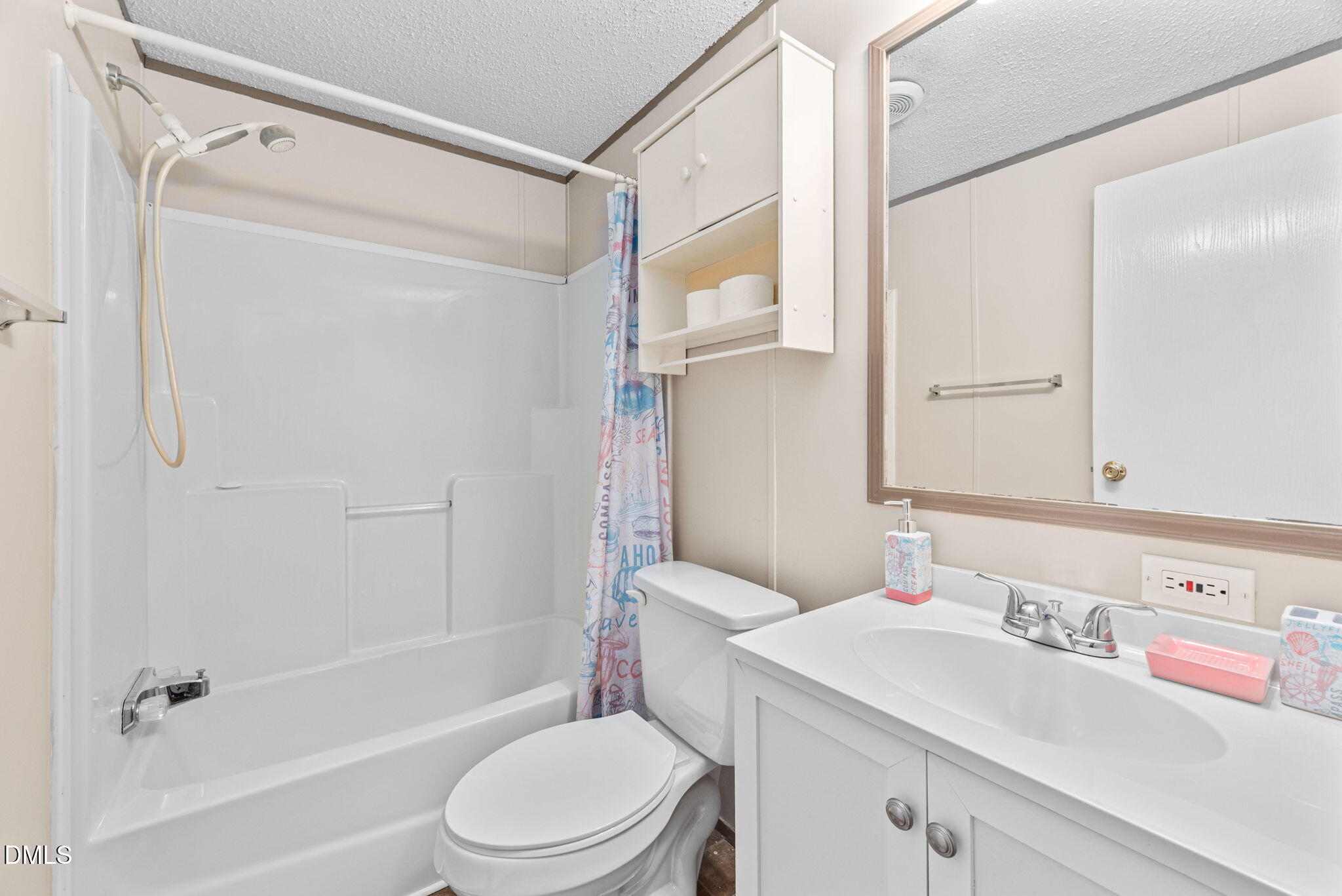 2005 Mooregate Court Clayton, NC 27520 - Photo 26 of 31 a bathroom with a sink toilet and shower