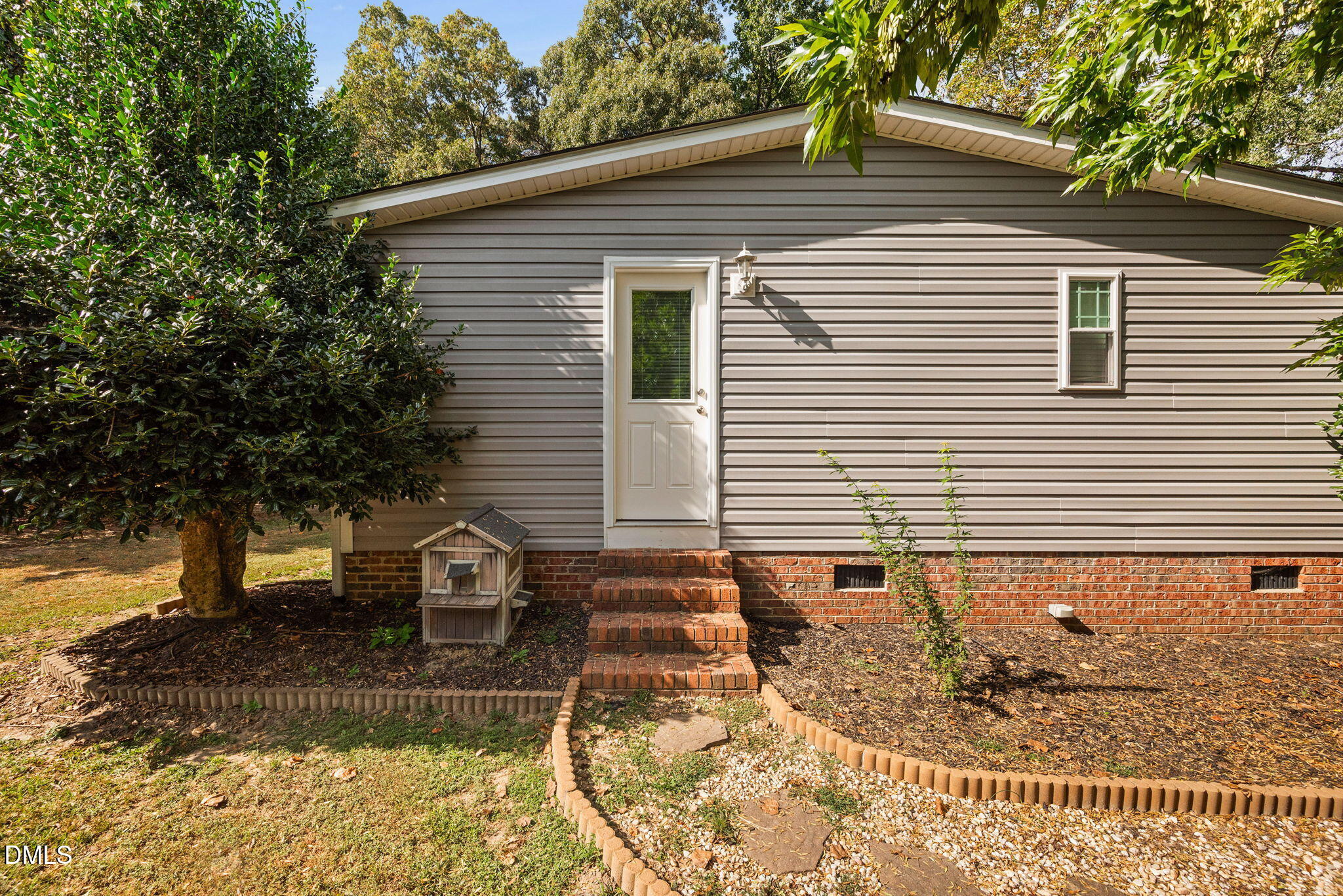 2005 Mooregate Court Clayton, NC 27520 - Photo 28 of 31 a front view of a house with garden