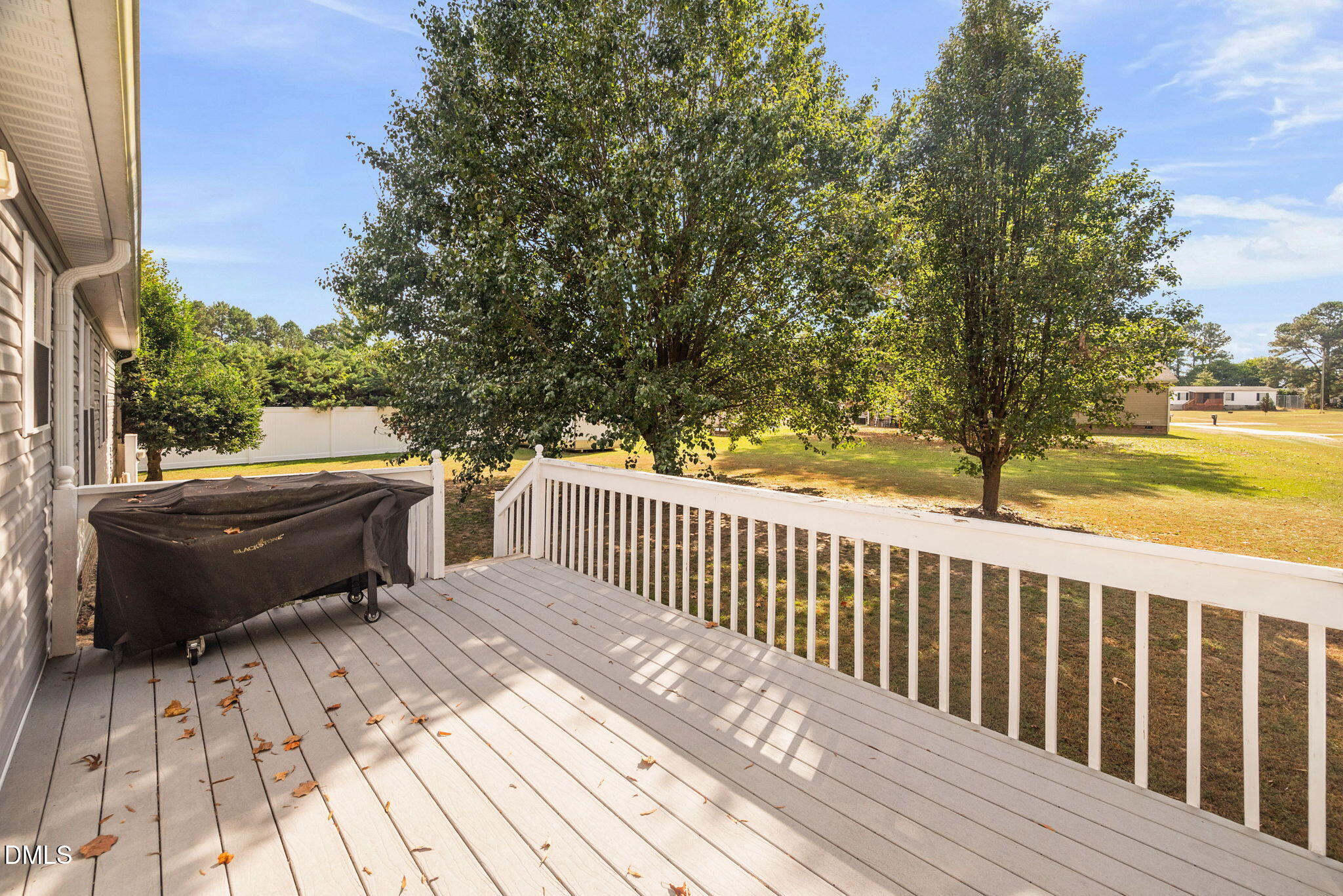 2005 Mooregate Court Clayton, NC 27520 - Photo 30 of 31 a view of balcony with wooden floor and fence