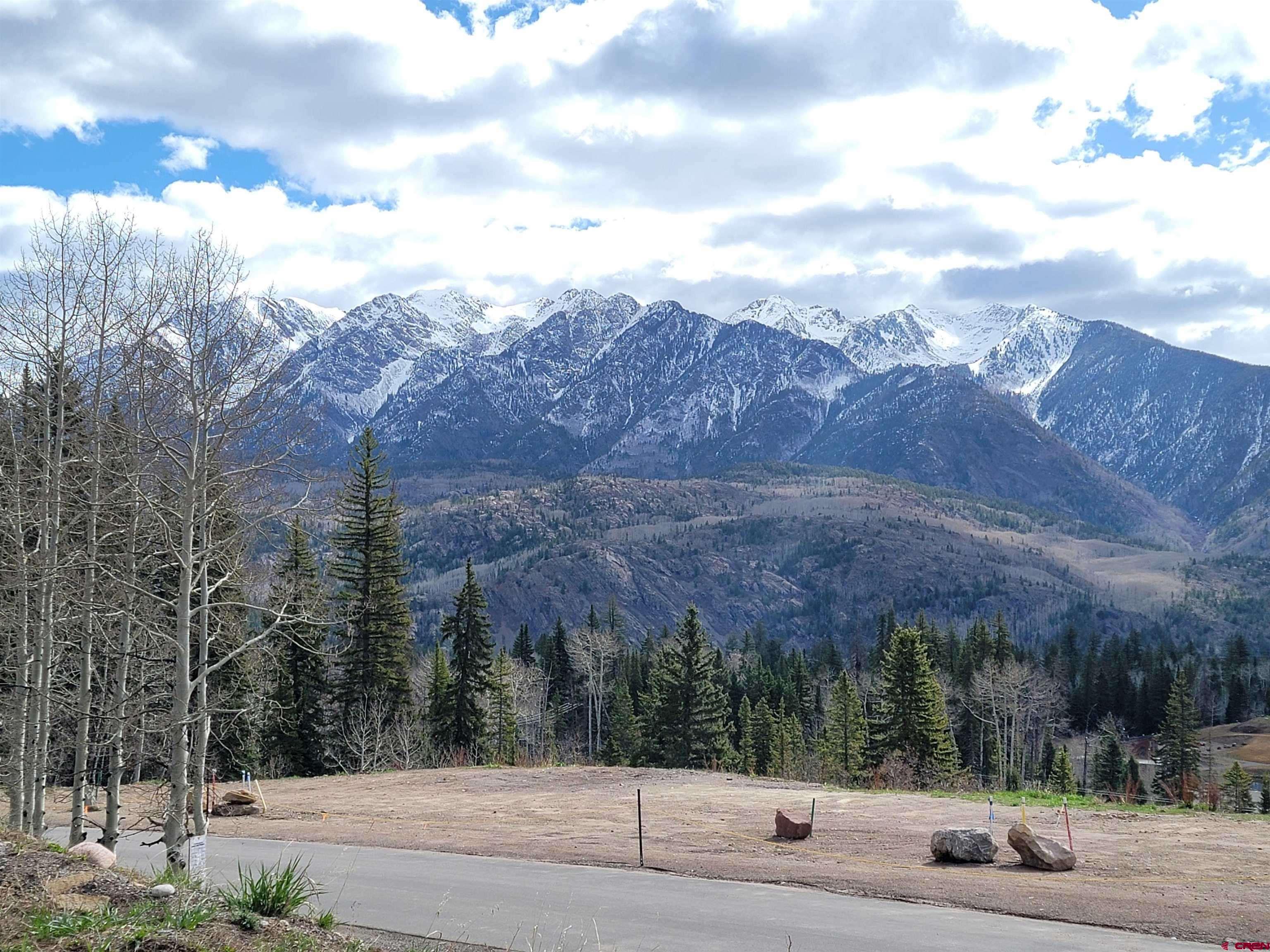 40 Hermosa Park Road Durango, CO 81301 - Photo 14 of 17 a view of a white house with a yard and mountain view