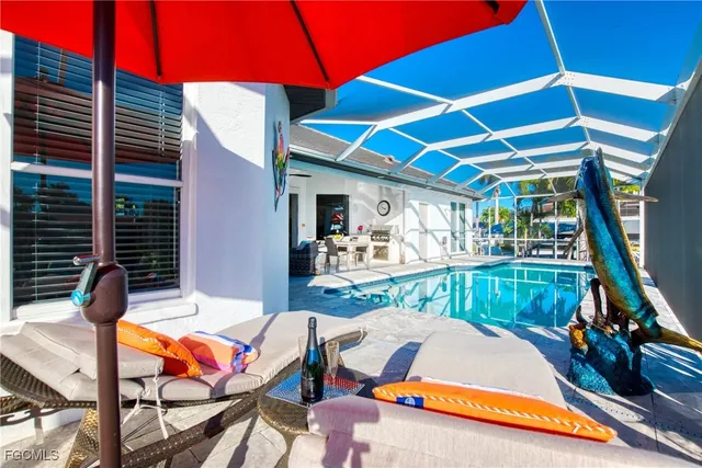 a view of swimming pool with patio