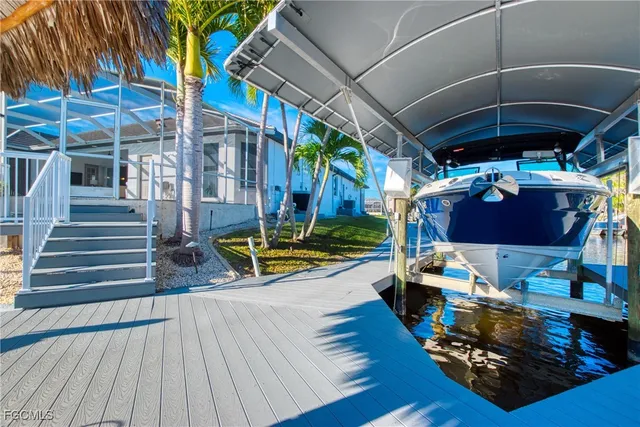 a view of swimming pool with a patio