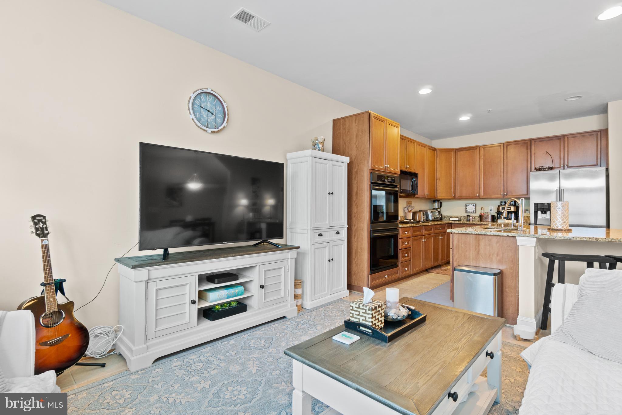 7657 President Street Fulton, MD 20759 - Photo 17 of 43 LIVING AND KITCHEN AREA