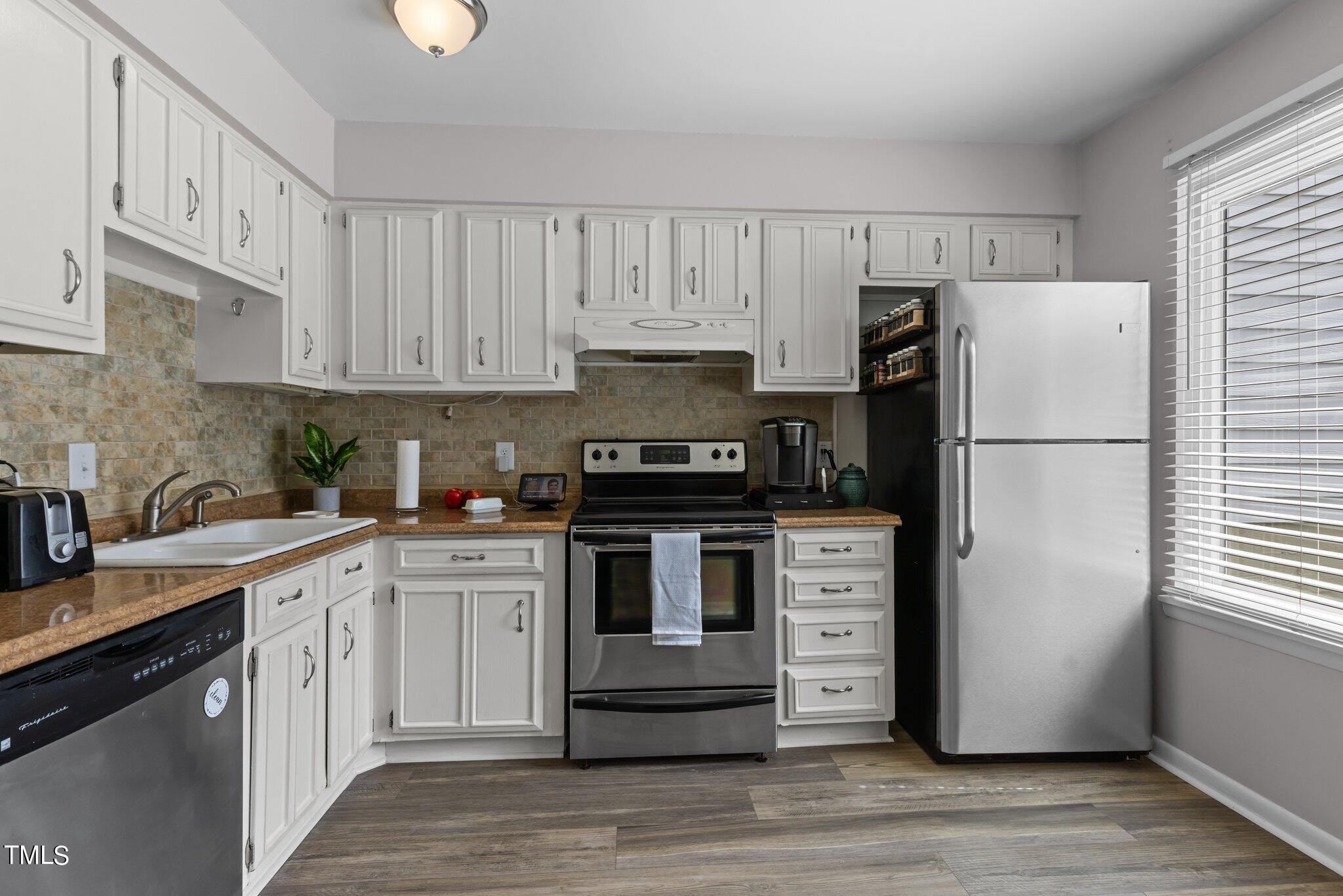 805 Green Ridge Drive Raleigh, NC 27609 - Photo 4 of 57 16-web-or-mls-8Y3A7825