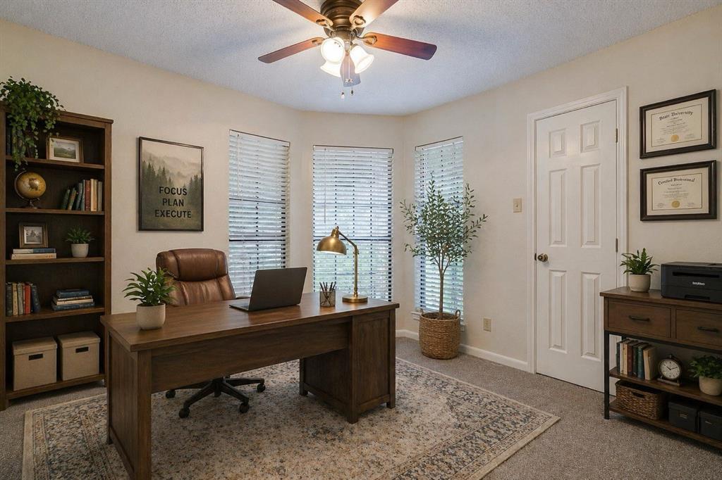 8613 Silver Creek Road White Settlement, TX 76108 - Photo 19 of 40 a work room with furniture and wooden floor