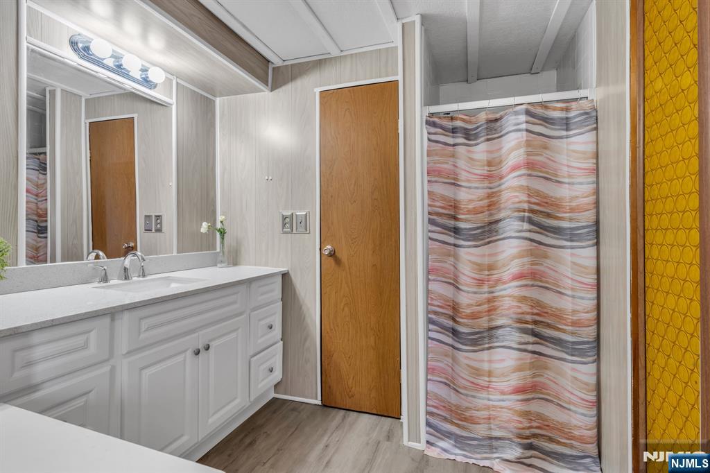 44 Nancy Lane Barnegat, NJ 08005 - Photo 18 of 23 a bath room with a sink and a mirror