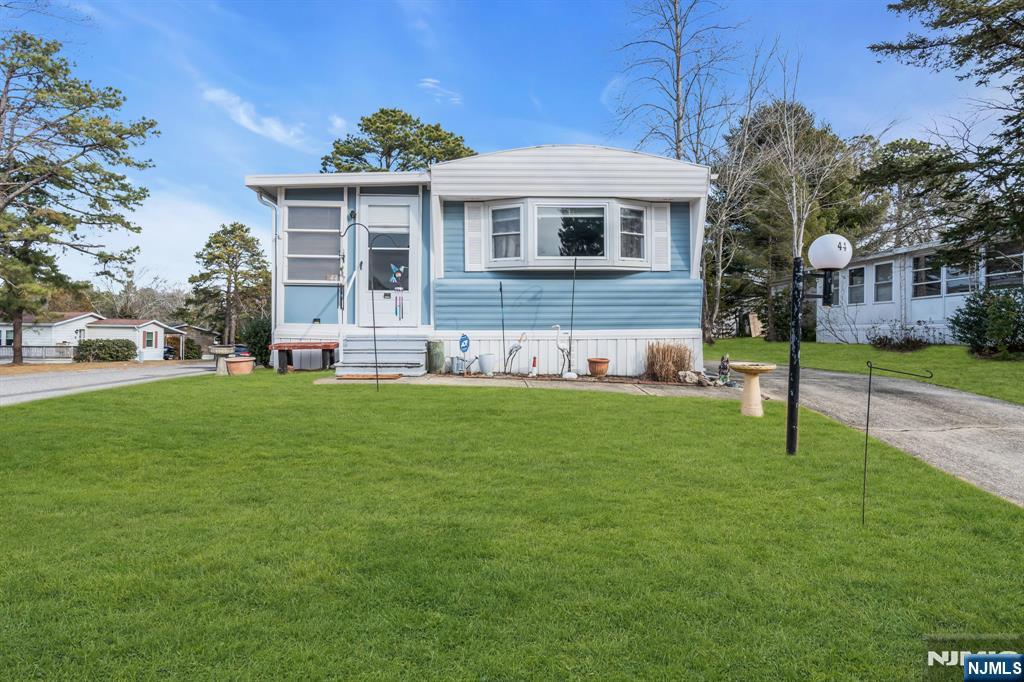 44 Nancy Lane Barnegat, NJ 08005 - Photo 2 of 23 a front view of a house with a yard