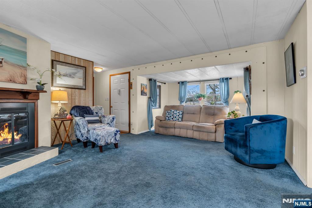 44 Nancy Lane Barnegat, NJ 08005 - Photo 4 of 23 a living room with furniture and a fireplace