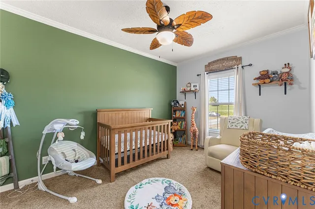 a bedroom with furniture and a window