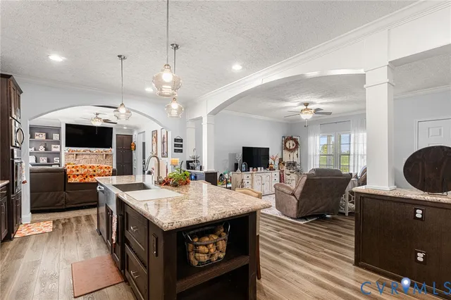 a living room with furniture and flat screen tv
