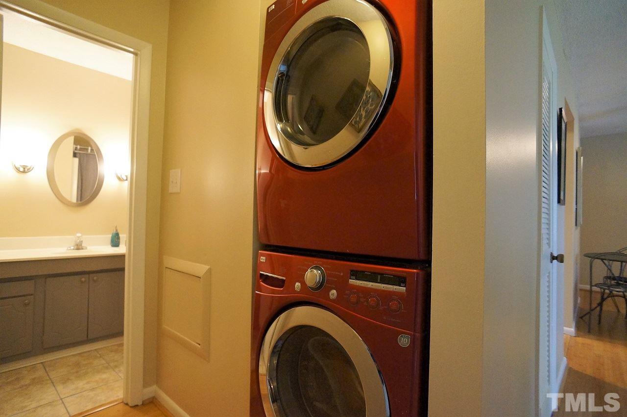 618 Pine Ridge Place, Unit 618 Raleigh, NC 27609 - Photo 19 of 20 a utility room with dryer and washer