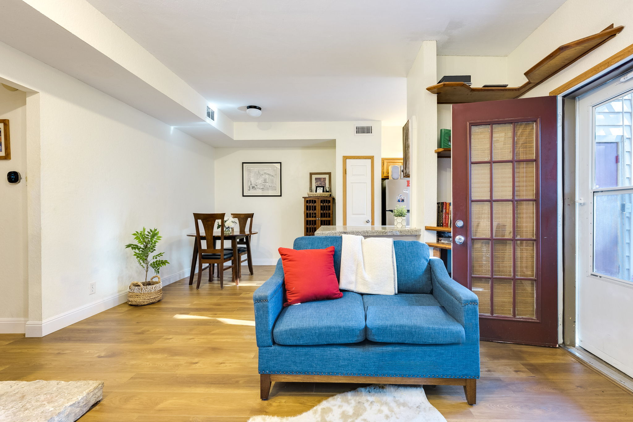 3809 Spicewood Springs Road, Unit 150 Austin, TX 78759 - Photo 11 of 35 a living room with furniture and wooden floor