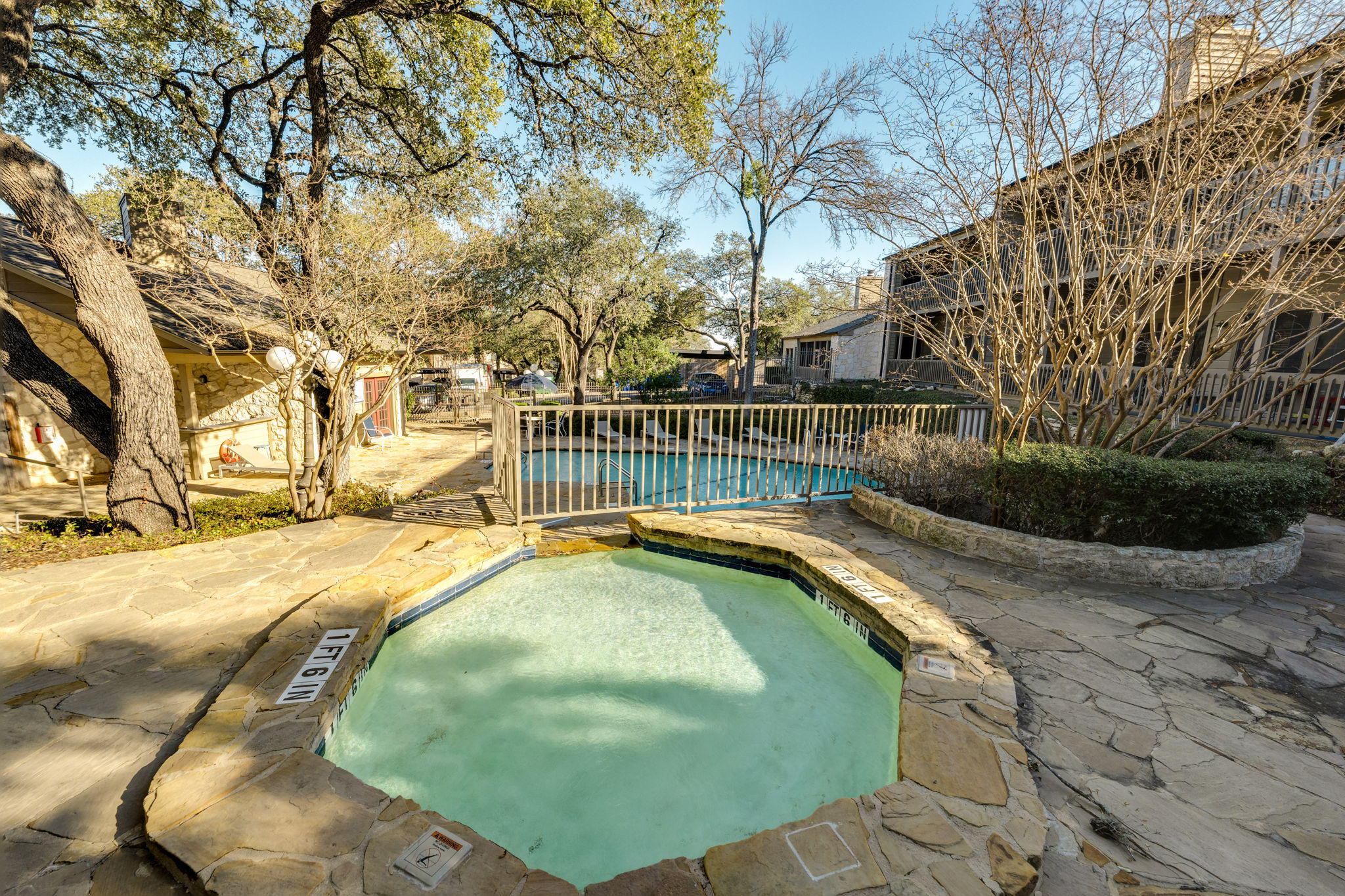 3809 Spicewood Springs Road, Unit 150 Austin, TX 78759 - Photo 6 of 35 a view of a swimming pool with a yard