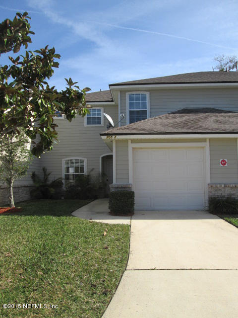 705 South Covered Bridge Road, Unit 2 St. Johns, FL 32259 - Photo 1 of 13 a front view of a house with garden