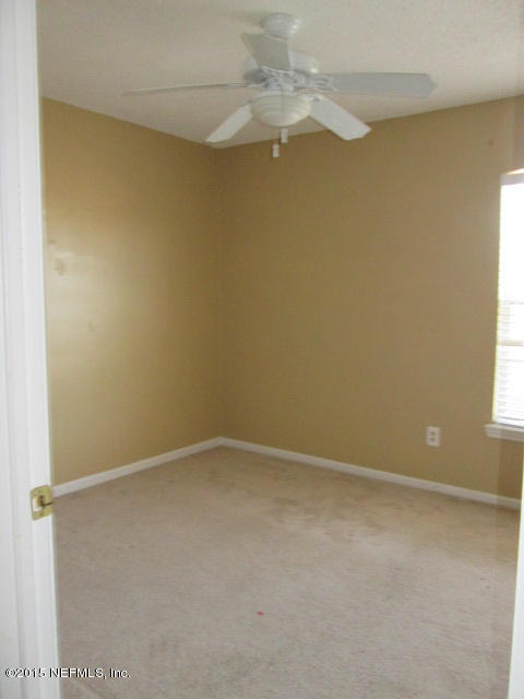 705 South Covered Bridge Road, Unit 2 St. Johns, FL 32259 - Photo 13 of 13 a view of an empty room with a window